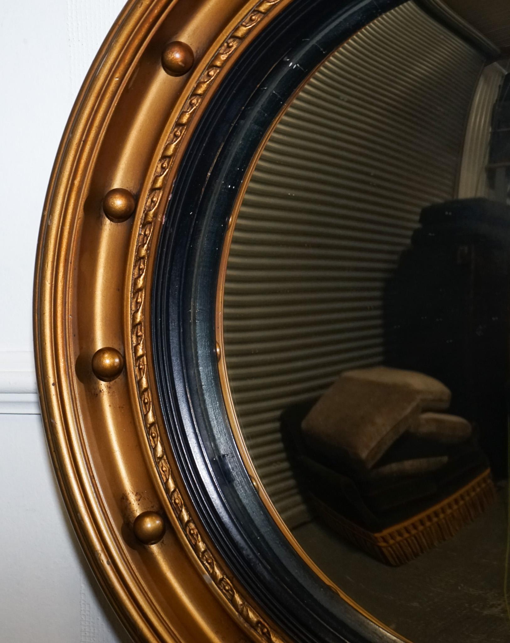 ANTIQUE 1920'S BUTLERS CONVEX BLACK & GOLD GILT WOOD WALL MiRROR In Good Condition For Sale In Pulborough, GB