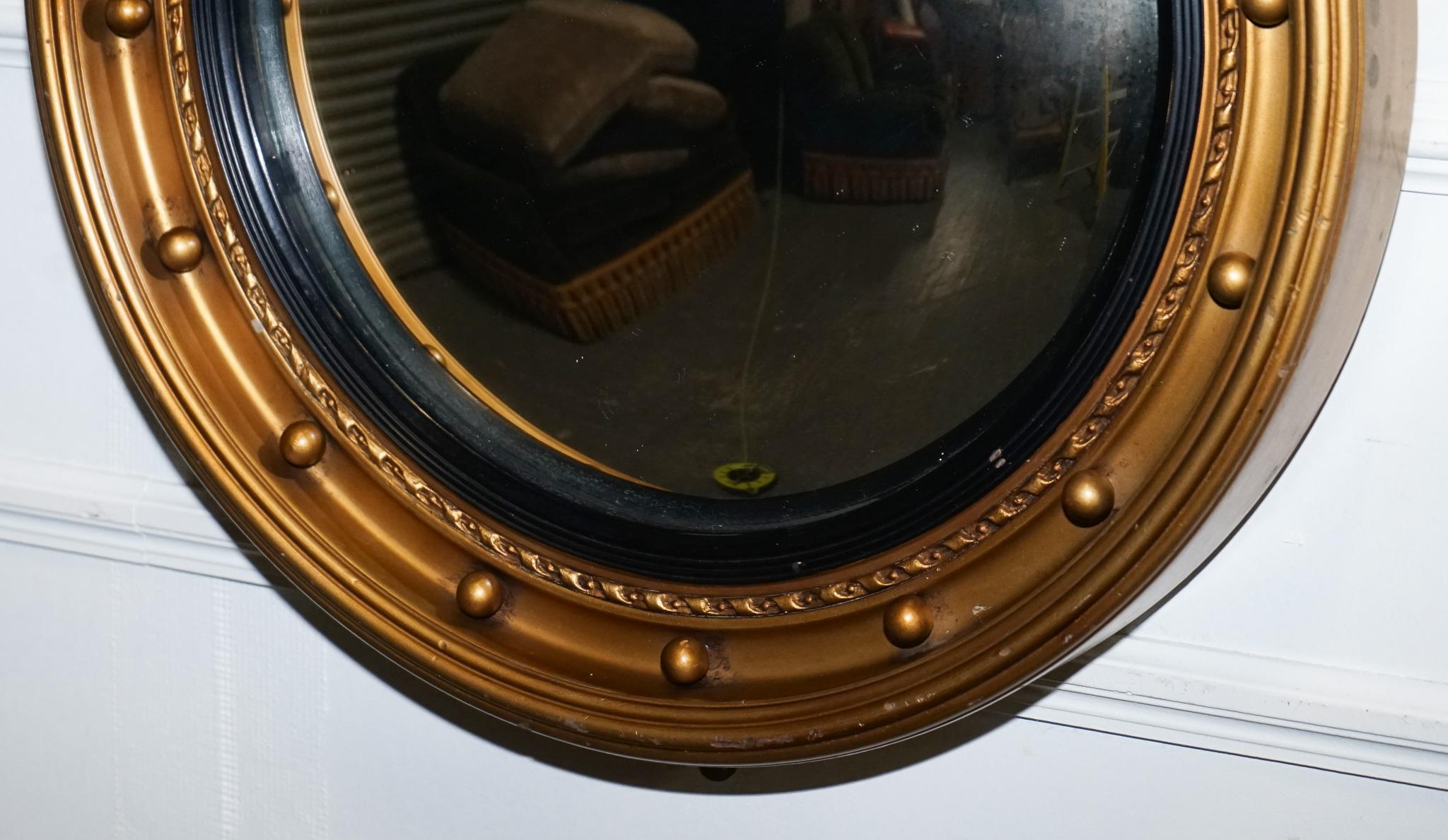 20th Century ANTIQUE 1920'S BUTLERS CONVEX BLACK & GOLD GILT WOOD WALL MiRROR For Sale