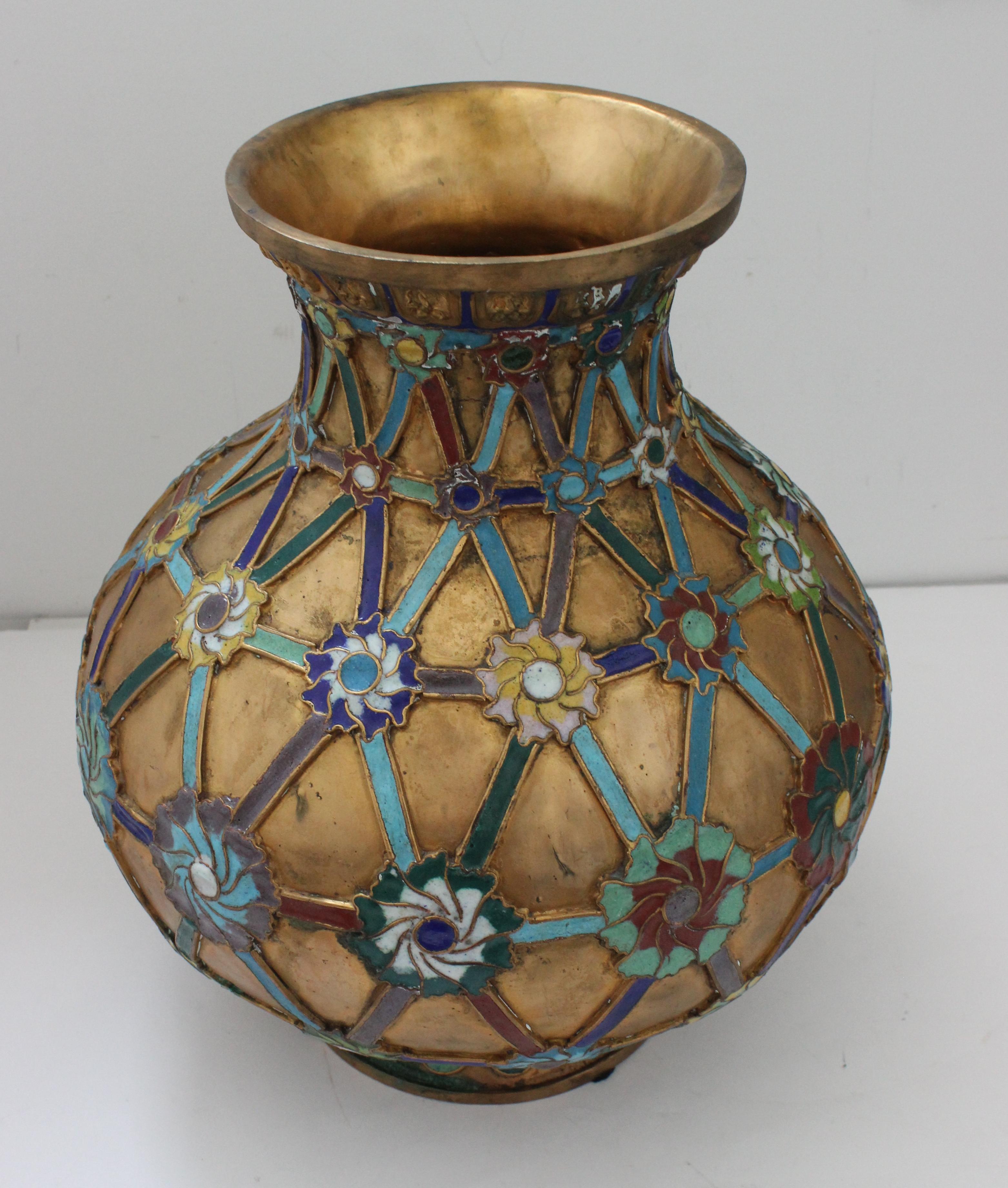 Antique 1920s Chinese Cloisonné vase in brass with crossbanding and floral medallions and blue enameled base from a Palm Beach estate.