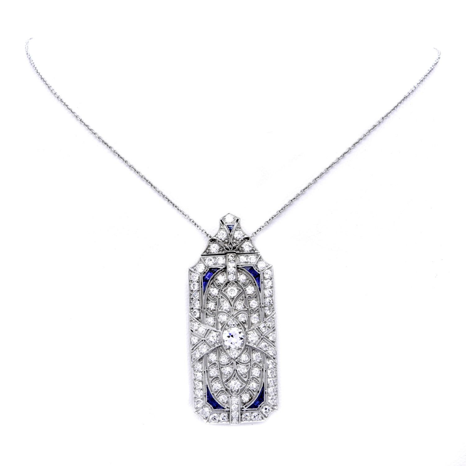 This very fine antique Designer Art deco 1920's diamond pendant Necklace and Brooch Pin was inspired by a floral motif and crafted in Luxurious Platinum.

Featuring round cut diamonds throughout weighing collectively appx. 2.40 carats.

Diamonds are