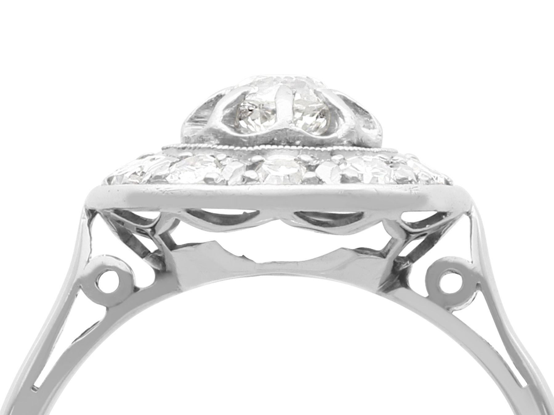 An impressive antique 0.50 carat diamond and 18 karat white gold cluster style dress ring; part of our diverse antique jewelry and estate jewelry collections.

This fine and impressive 1920s diamond ring has been crafted in 18k white gold.

The
