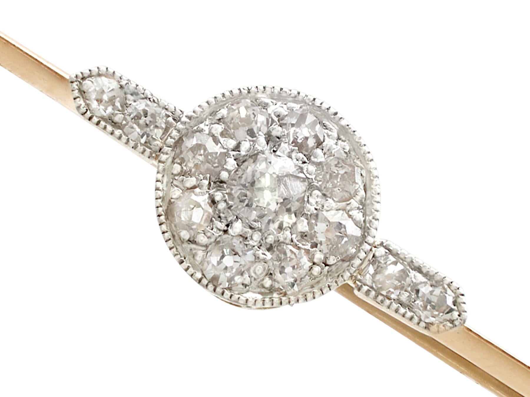 An impressive antique 0.43 carat diamond and 14 karat yellow gold, 14 karat white gold set bar brooch; part of our diverse antique jewelry and estate jewelry collections.

This fine and impressive diamond brooch has been crafted in 14k yellow gold