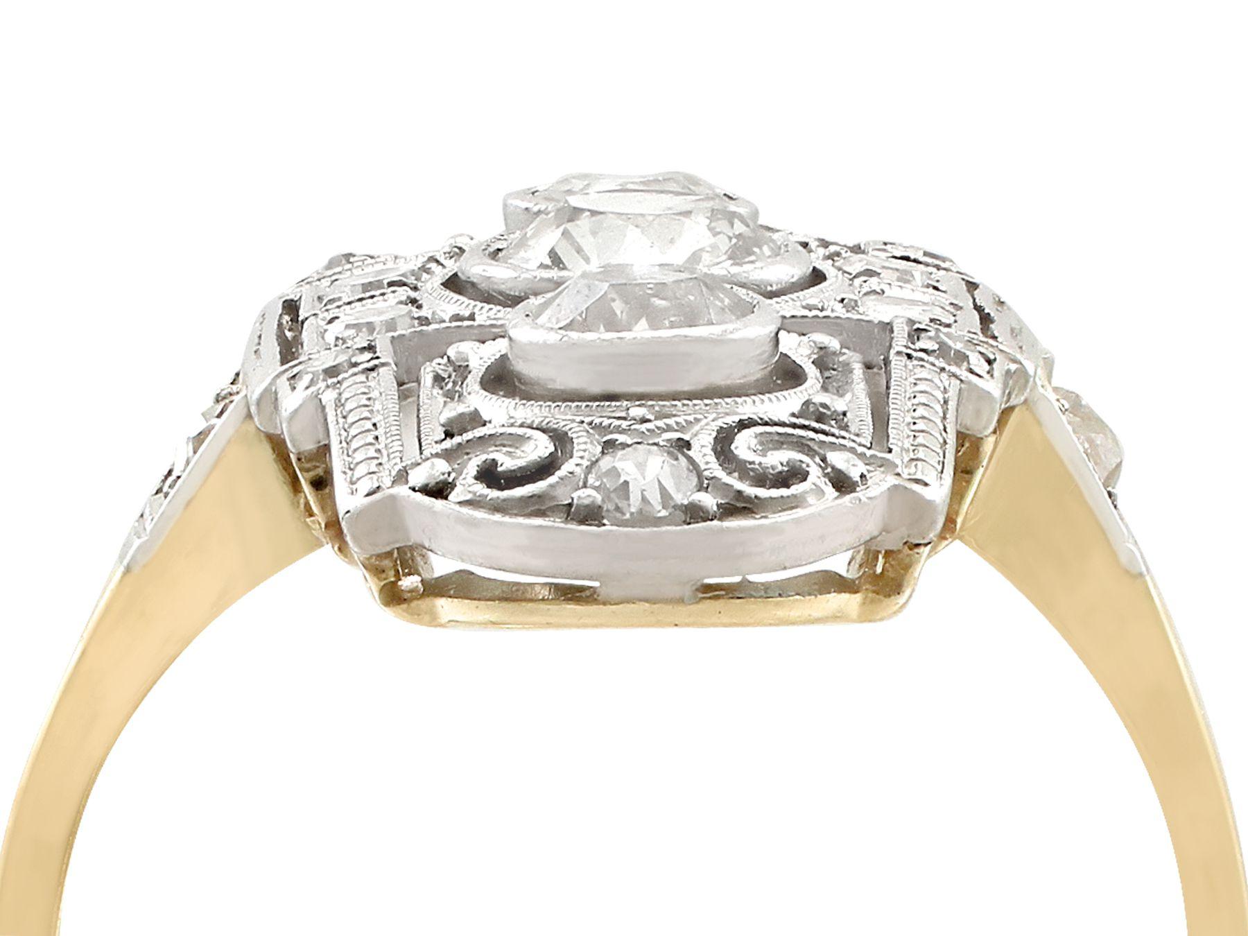 An impressive antique Art Deco 0.87 carat diamond and 14 karat yellow gold, 14 karat white gold set dress ring; part of our diverse antique jewelry collections.

This fine and impressive Art Deco 1920s diamond ring has been crafted in 14k yellow