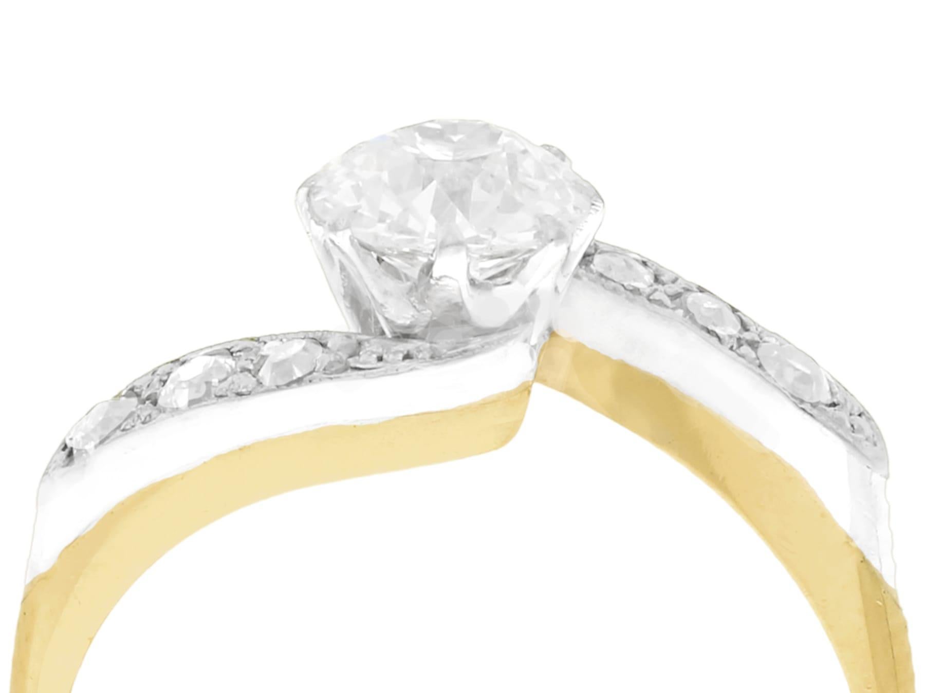 A fine and impressive antique 0.83 carat diamond and 18 karat yellow gold, silver set twist ring; part of our diverse antique jewelry collections.

This fine and impressive antique diamond ring has been crafted in 18k yellow gold with a silver