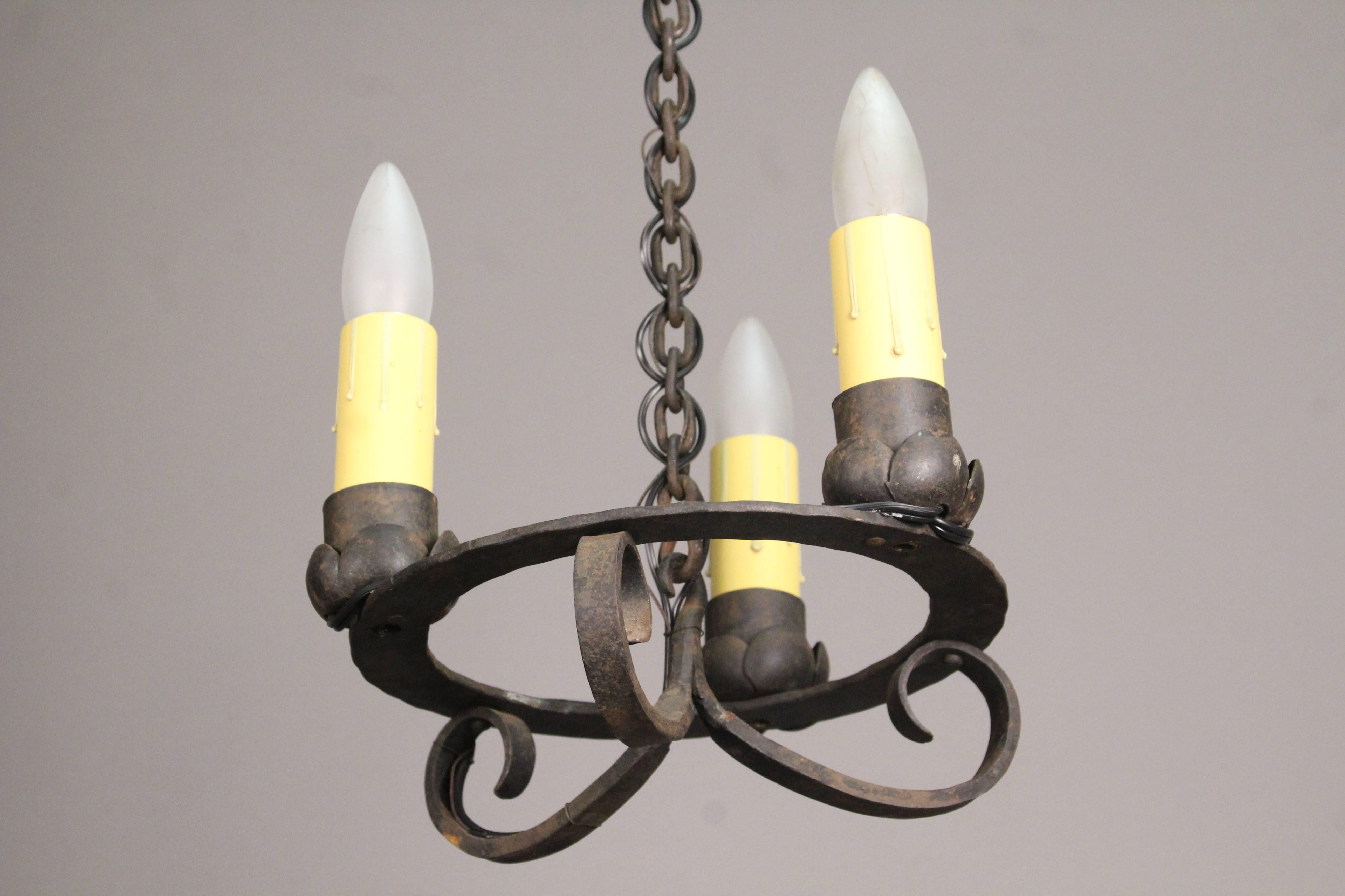 1920s Spanish Revival wrought iron chandelier. Measure: 12.5
