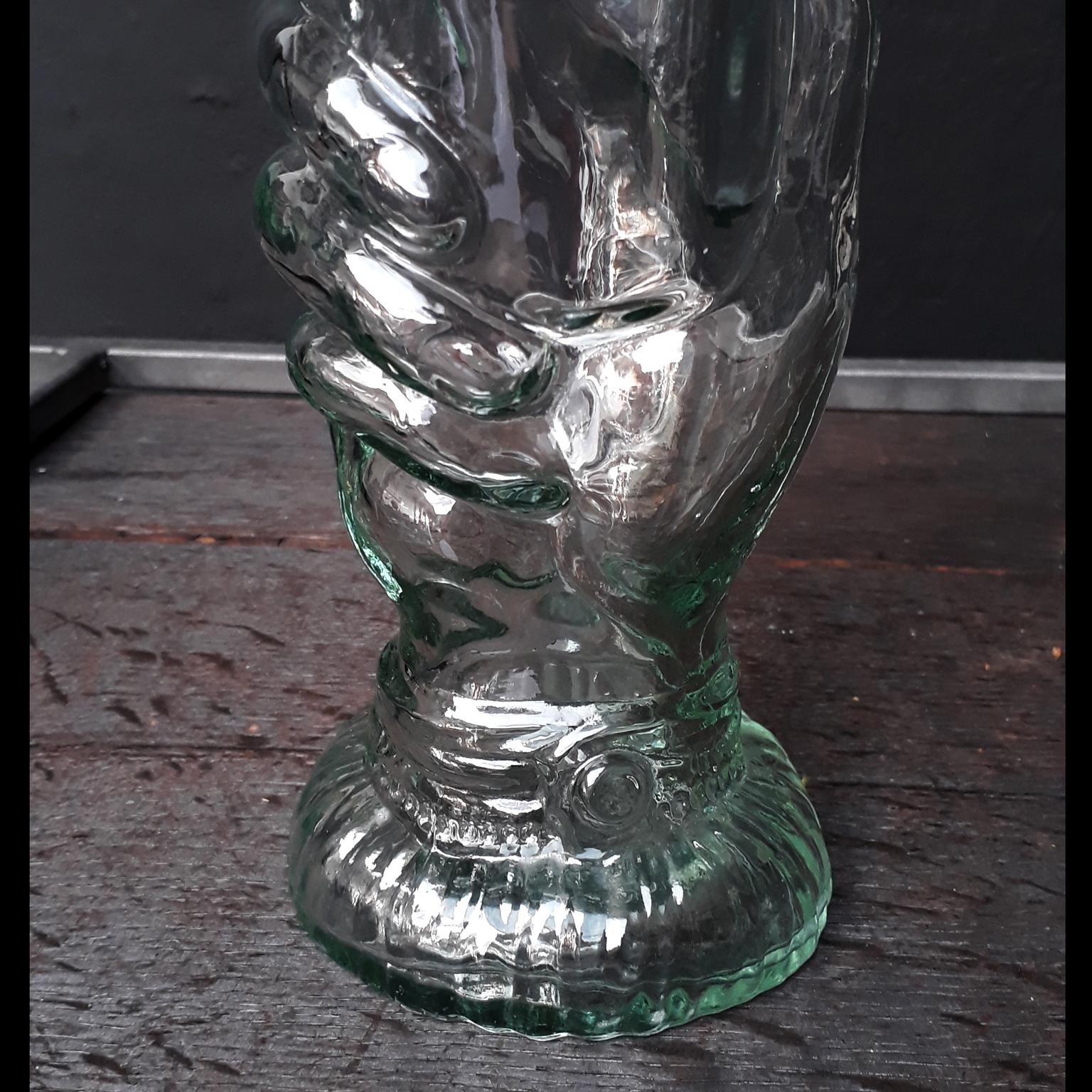 hand shaped bottle