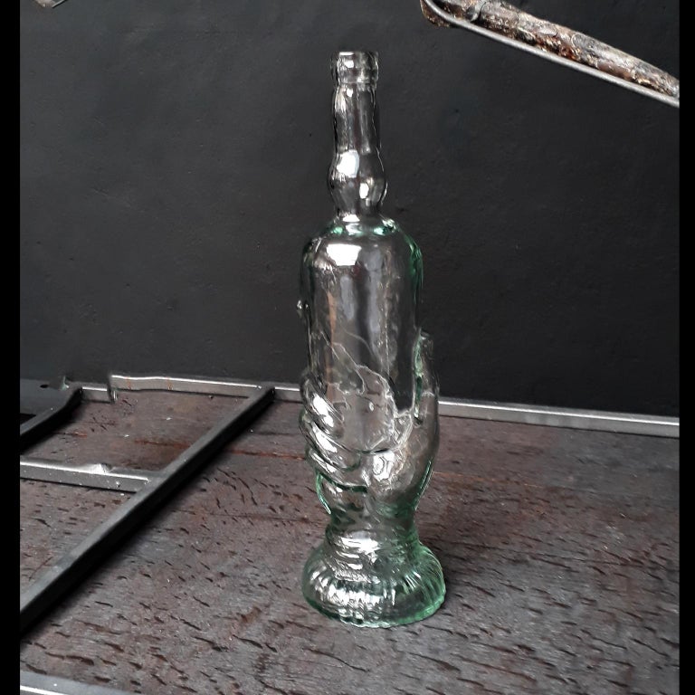 https://a.1stdibscdn.com/antique-1920s-french-green-pressed-glass-hand-shaped-soap-bottle-for-sale/f_10404/1616596682374/hand_bottle_green_01_master.jpg?width=768