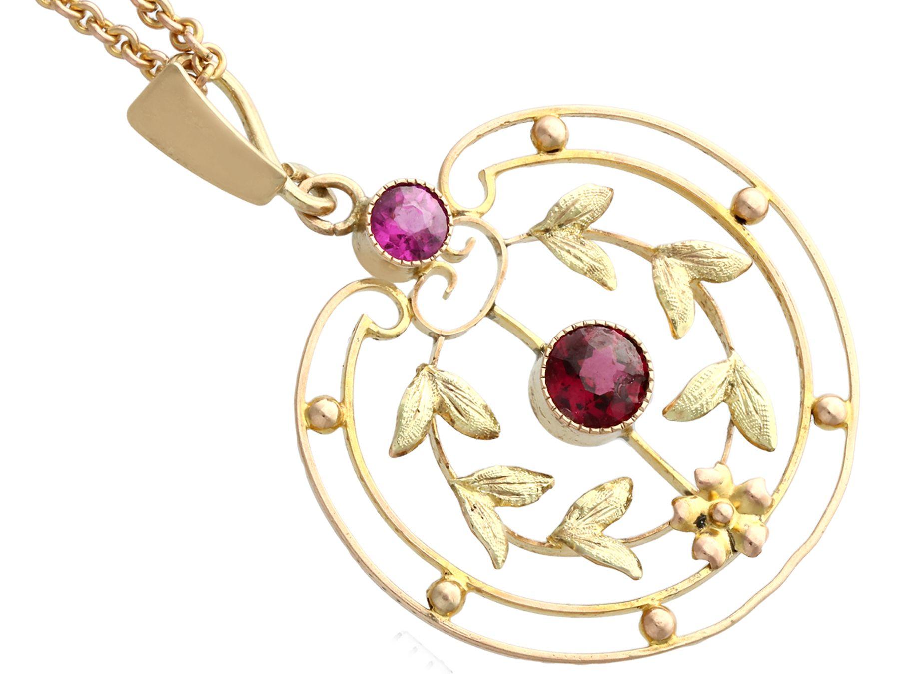 Round Cut Antique 1920s Garnet and Amethyst Yellow Gold Pendant For Sale