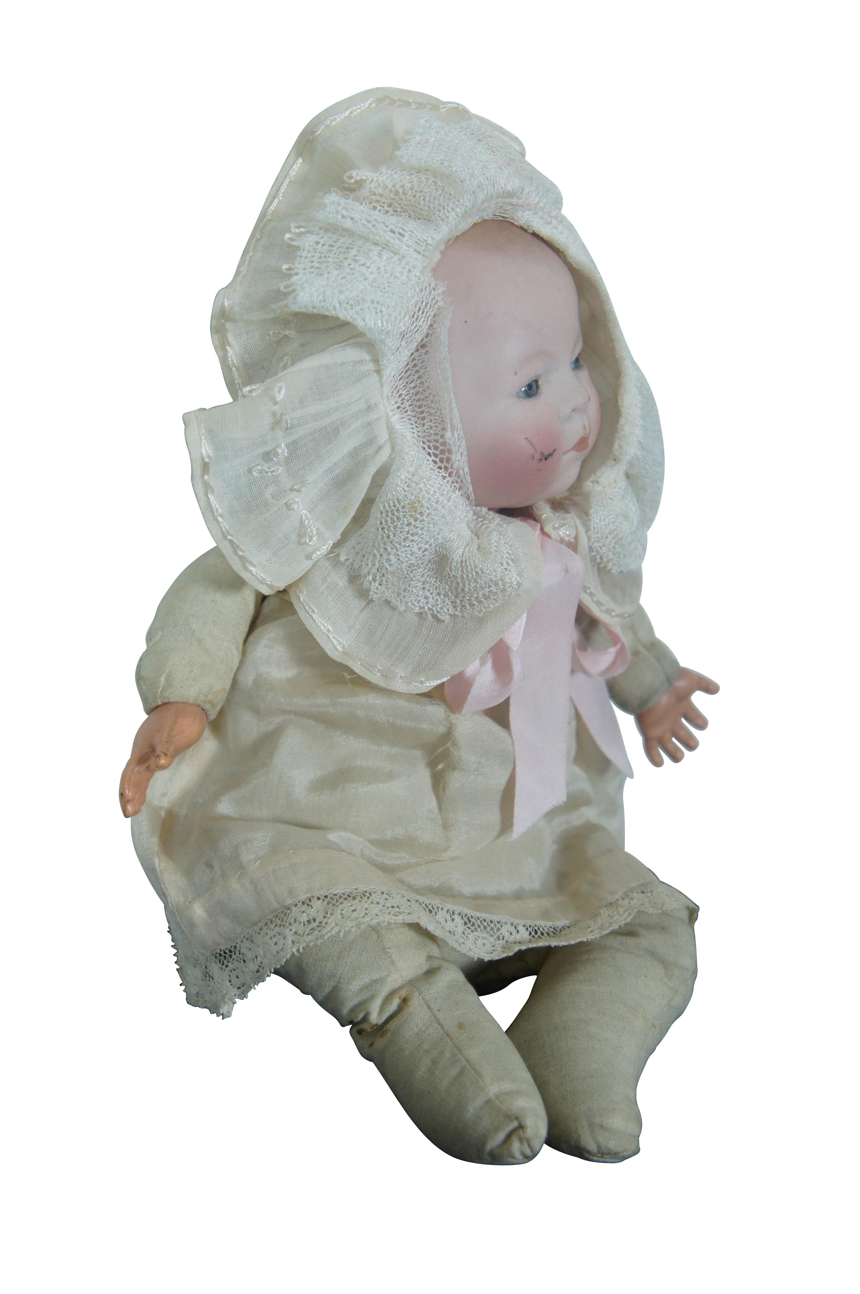 The Bye-Lo Baby was designed by an American artist, Grace Storey Putnam, and was produced by George Borgfeldt & Co. of New York, which had the bisque heads made in Germany by such well-known porcelain factories as Kestner, Kling, Hertel & Schwab,