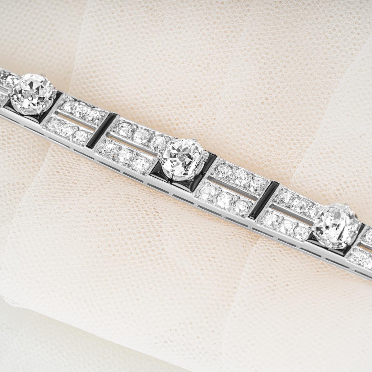 Women's or Men's Antique 1920s Onyx Diamond Platinum Brooch 5.80 Cts For Sale