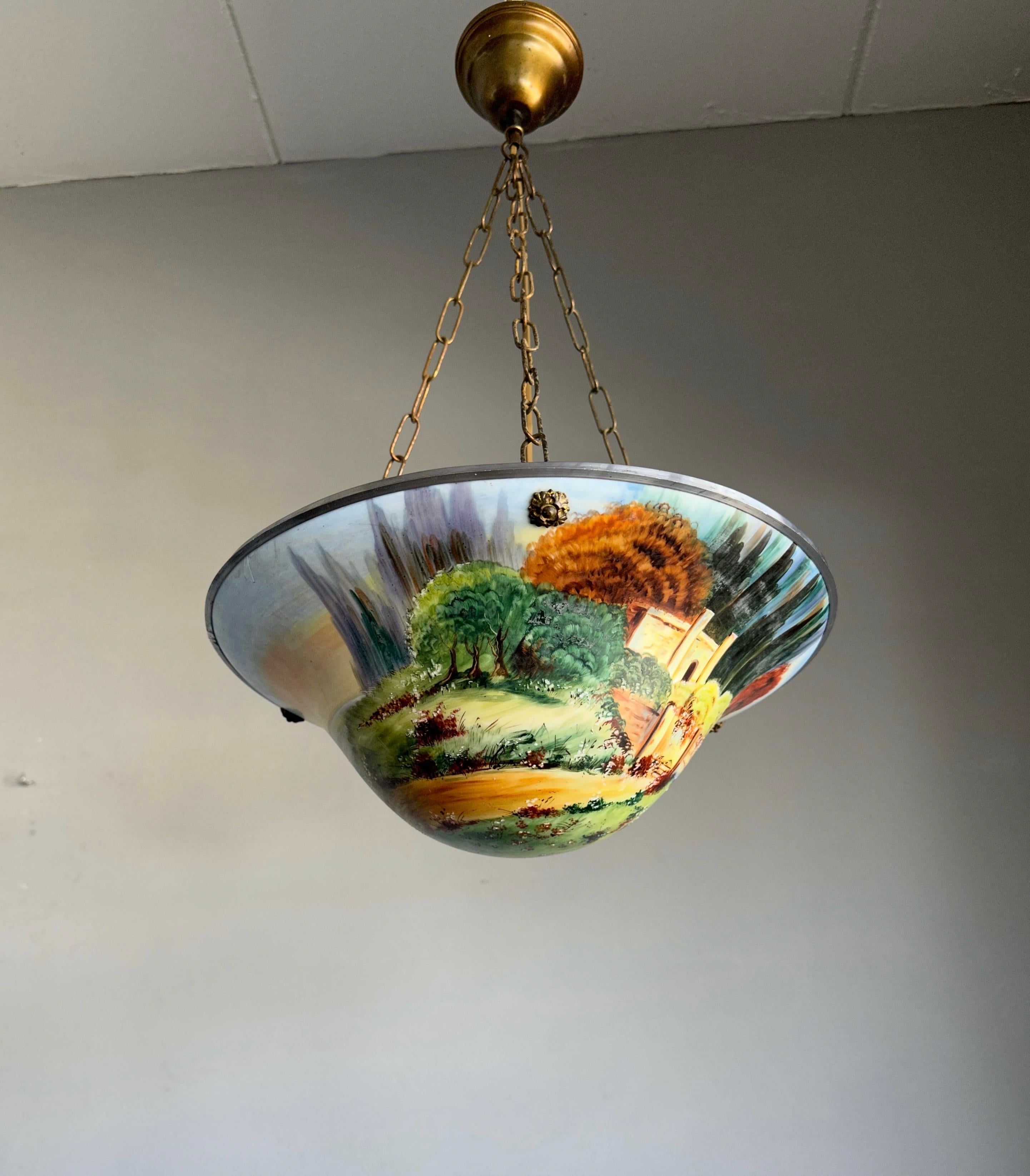 Incredibly beautiful light fixture with a landscape decor of amazing natural colors.

This rare, beautifully designed and very finely decorated pendant is destined to grace someone's entrance, landing or bedroom soon, because if you are looking