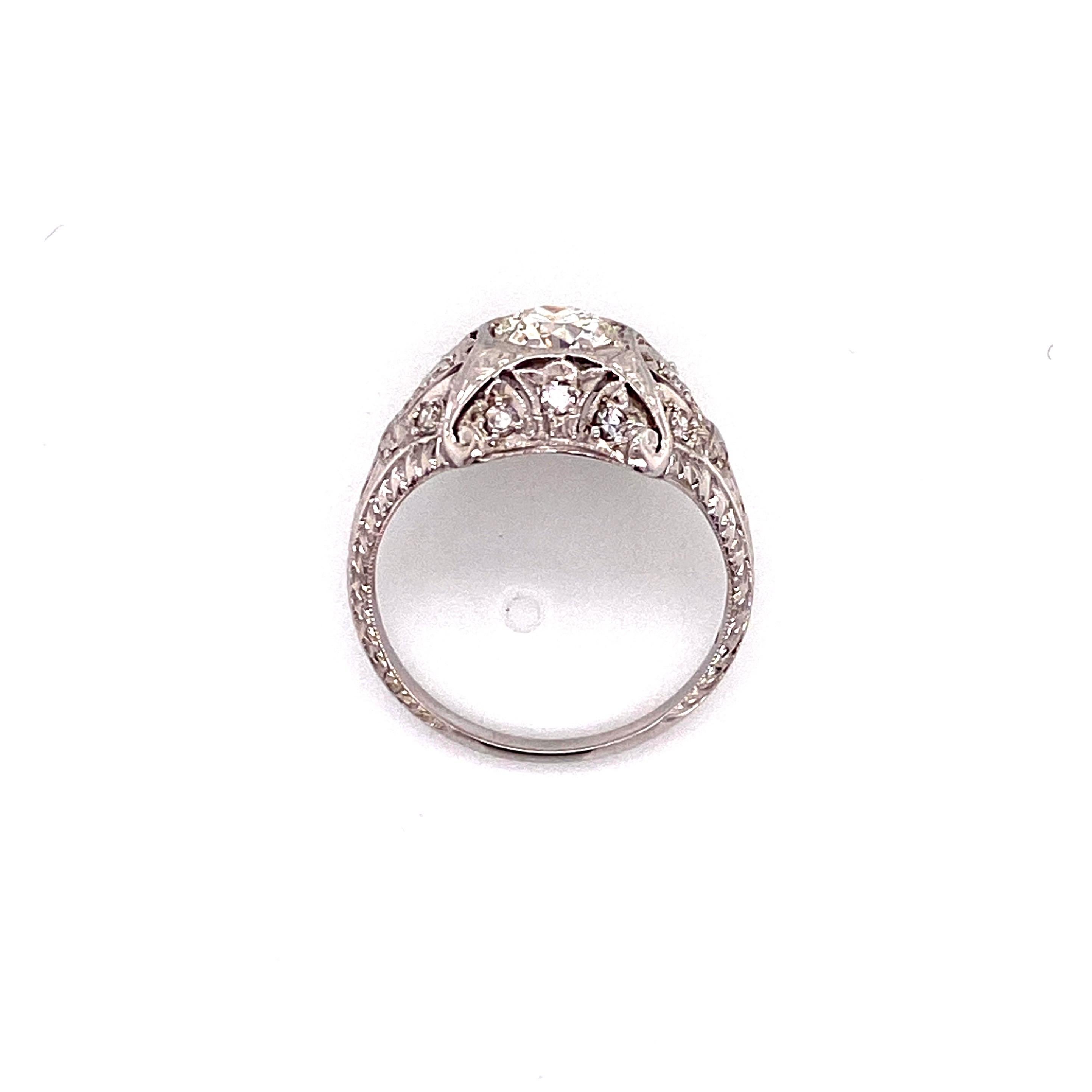 Women's Antique 1920s Platinum Diamond Engagement Ring .74 Carat For Sale
