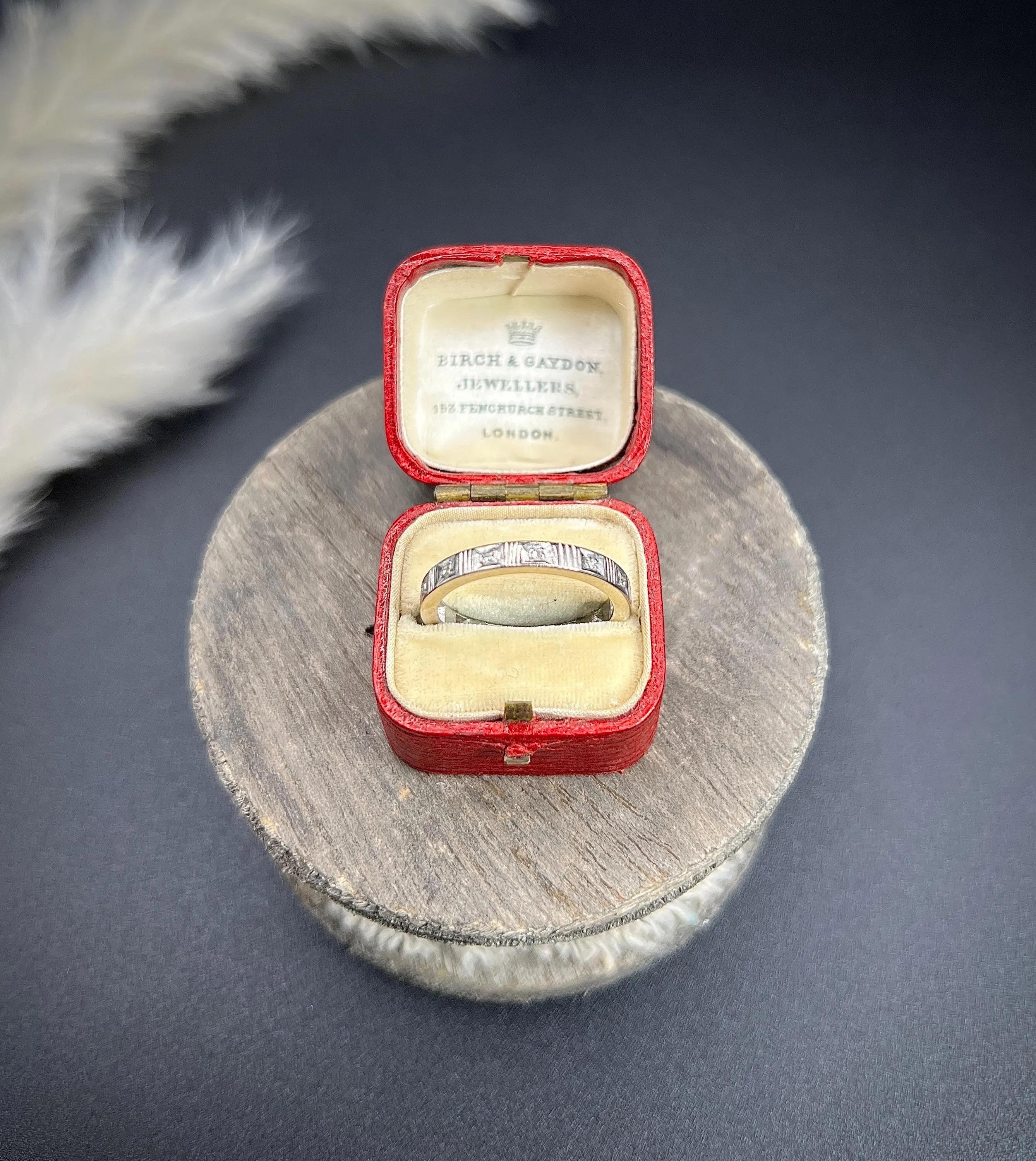 Antique Eternity Ring 

Platinum Tested

Circa 1920s

This exquisite 1920s platinum band embodies the elegance and craftsmanship of the Art Deco era. Delicately set with alternating sections of square set diamonds, the ring catches the light