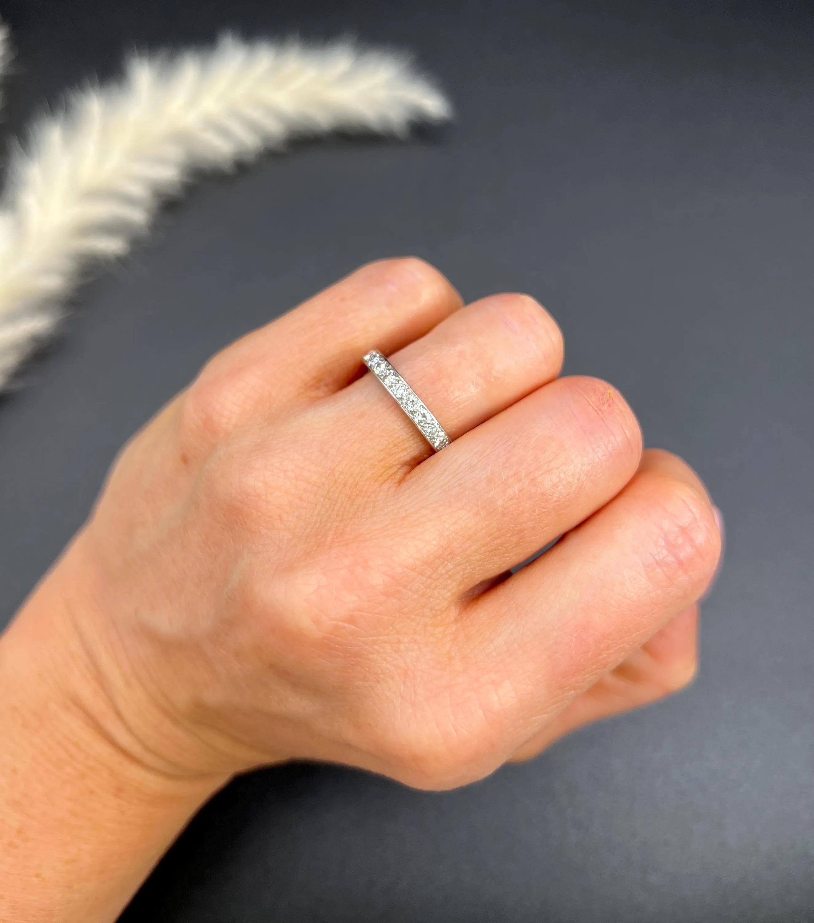Antique Eternity Ring 

Platinum French Stamped

Circa 1920s

This exquisite platinum eternity ring is an absolute beauty. It is fully set with approximately 2 Carats of fabulous French diamonds that sparkle and shine brilliantly. The ring is