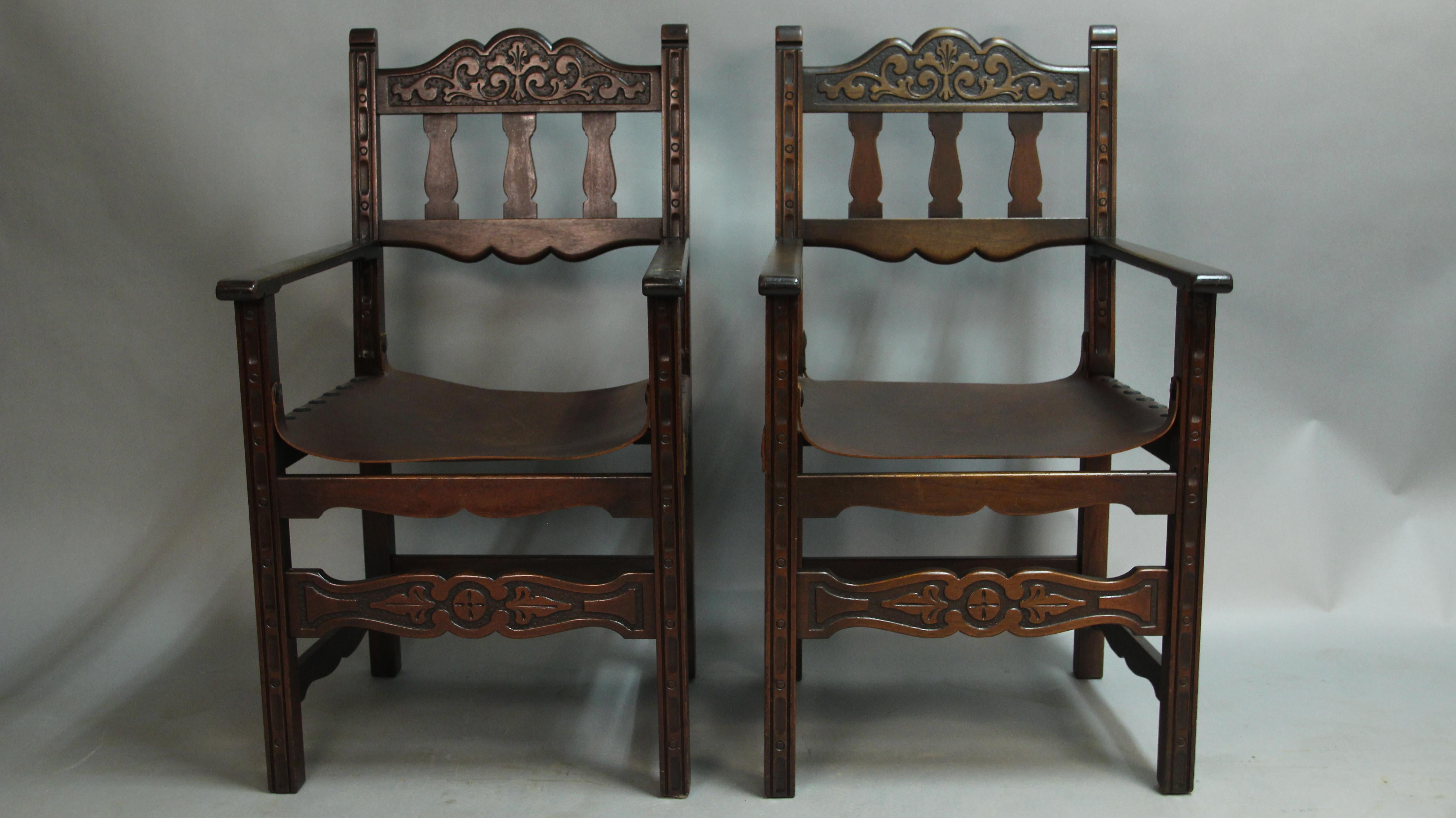 1920s Spanish Revival chairs. Reupholstered with new leather. The set has 2 captain chairs. The two captain chairs measure 40