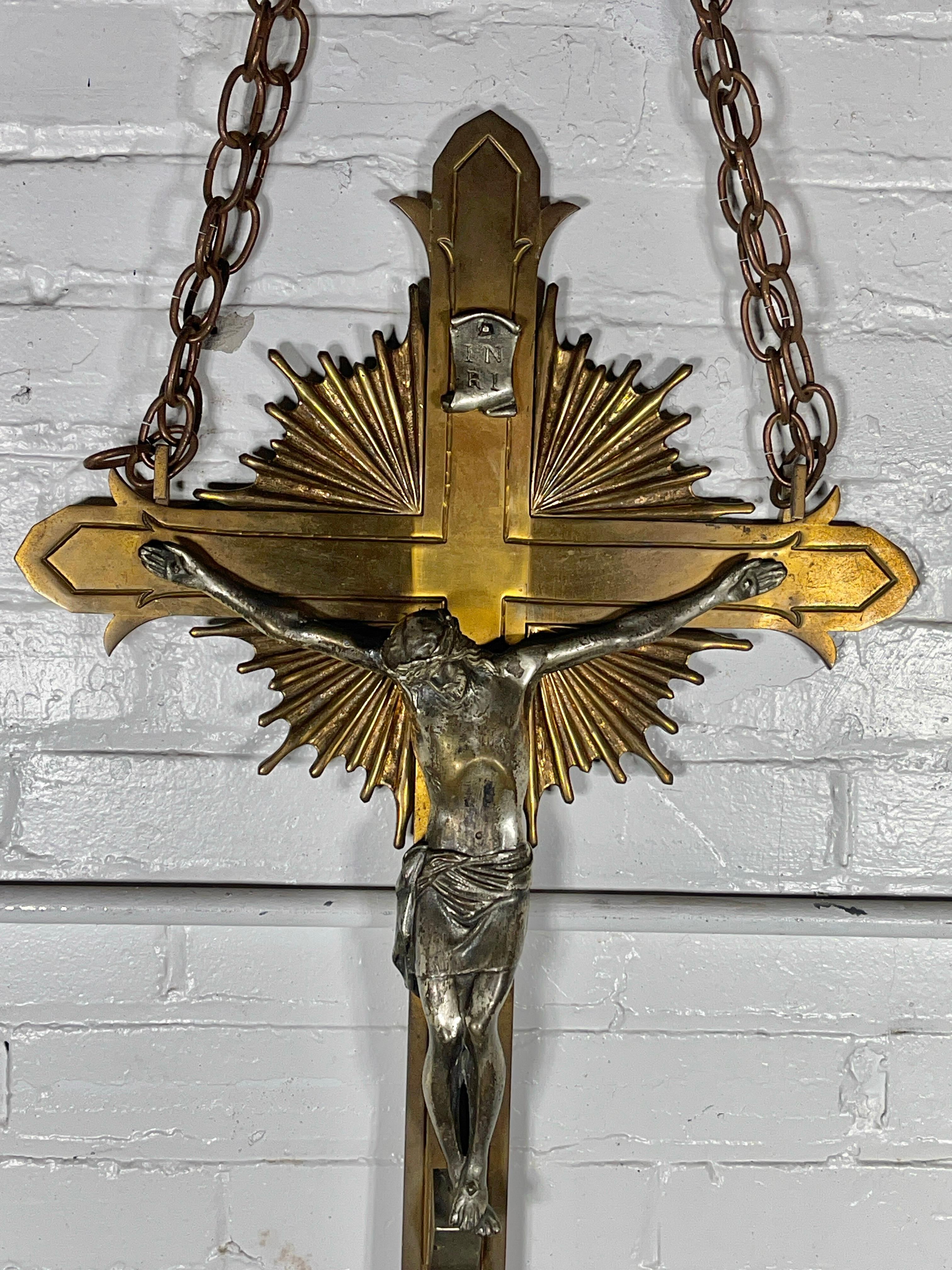 Beautiful Antique 1920's solid Bronze Stylized Crucifix  with Silver Plated or silver leaf Jesus Christ, Excellent casting, wonderful patina , superior quality, Retains original chain to mount. Also retains the Chi-Rho symbol. one of the earliest