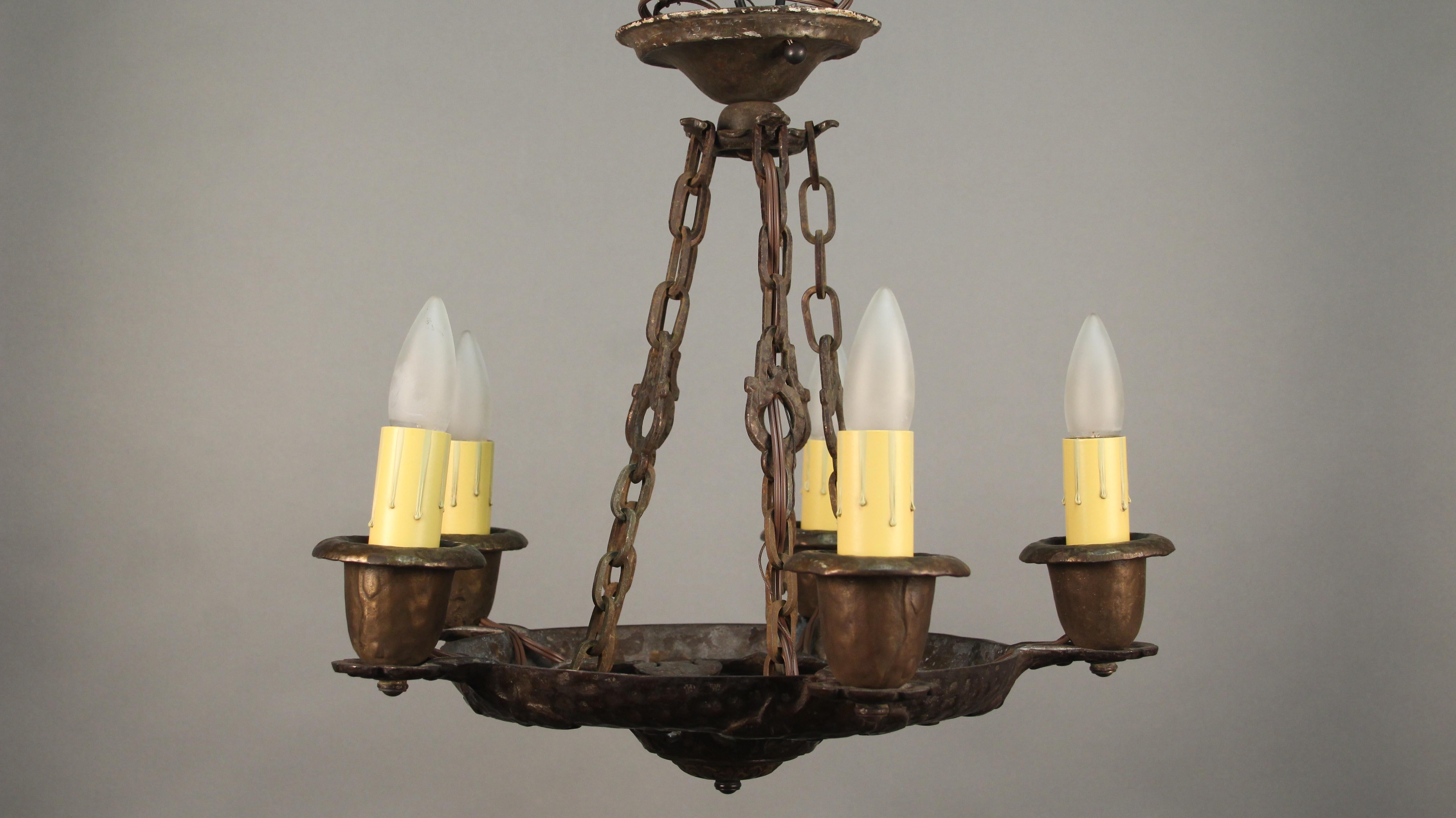 Five-light chandelier with hammered texture, circa 1920s. Measures: 16.5