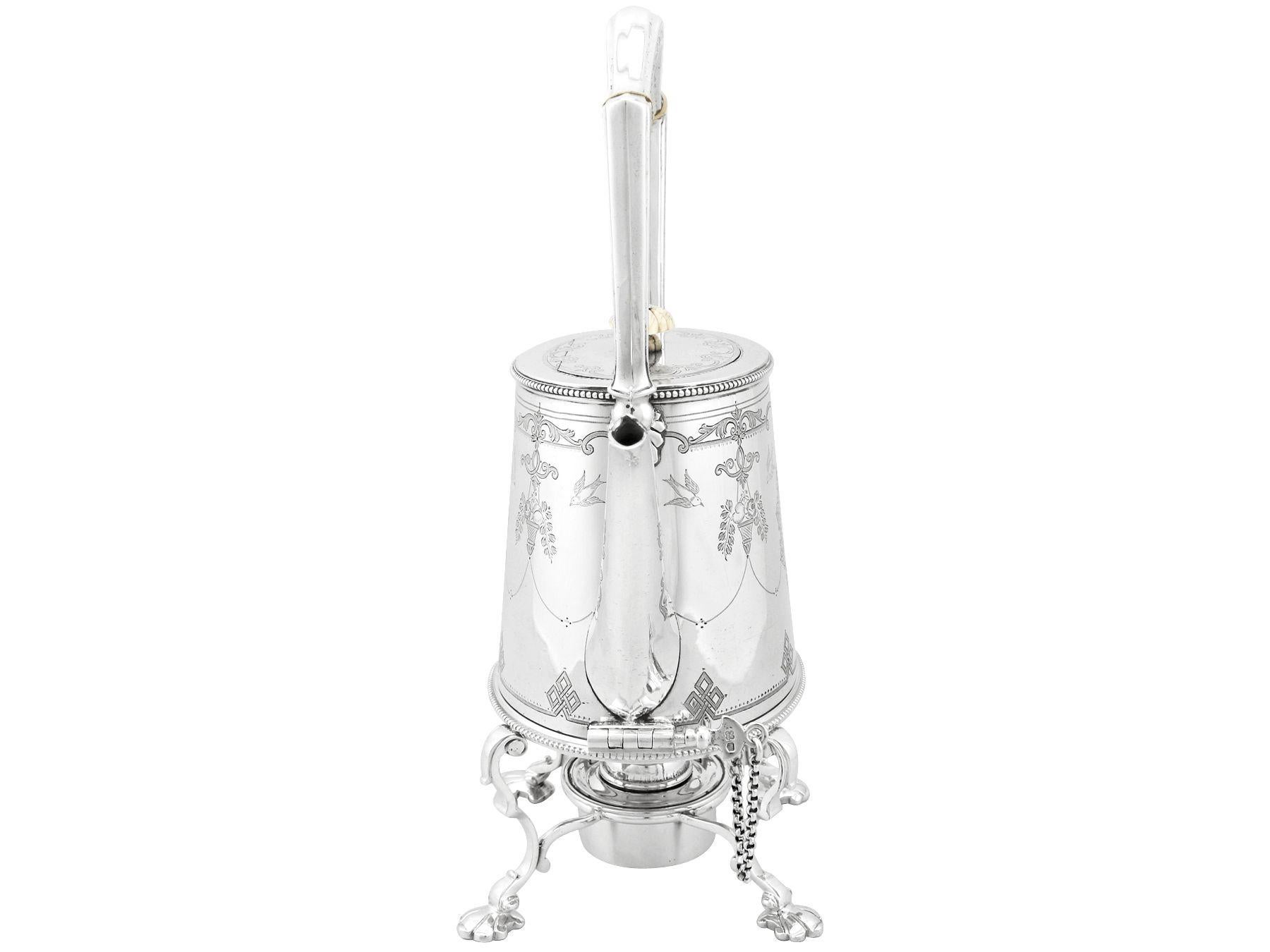 An exceptional, fine and impressive antique George V English sterling silver spirit kettle on stand; an addition to our antique silver teaware collection

This exceptional antique George V sterling silver spirit kettle has a tapering oil can