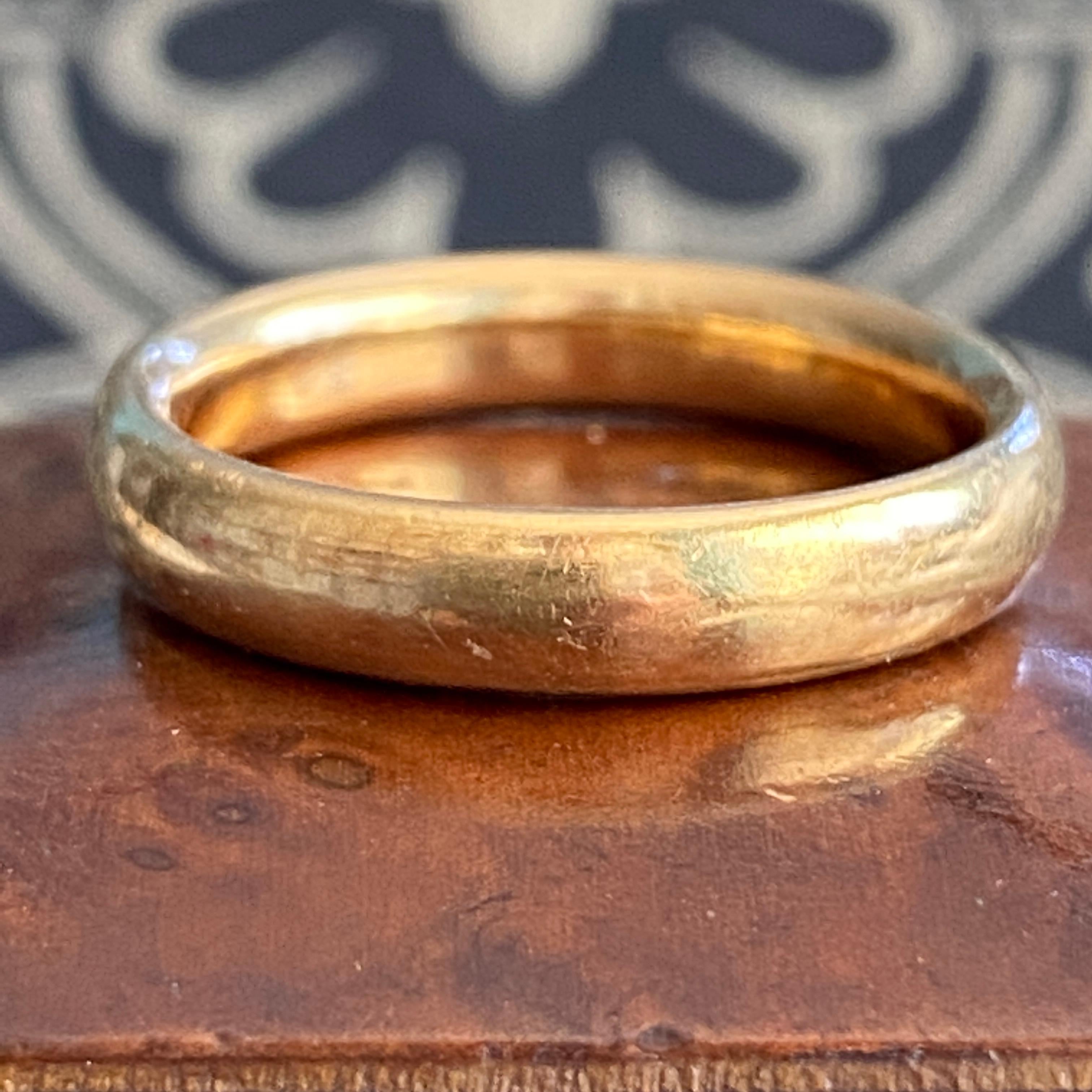 Details:
Art Deco chunky antique wedding band in heavy buttery 22K yellow gold! It is so lovely, and soft. It has a rounded fit, and is very comfortable on your hand. This band would pair nicely with a diamond band or another 22K ring! The ring has