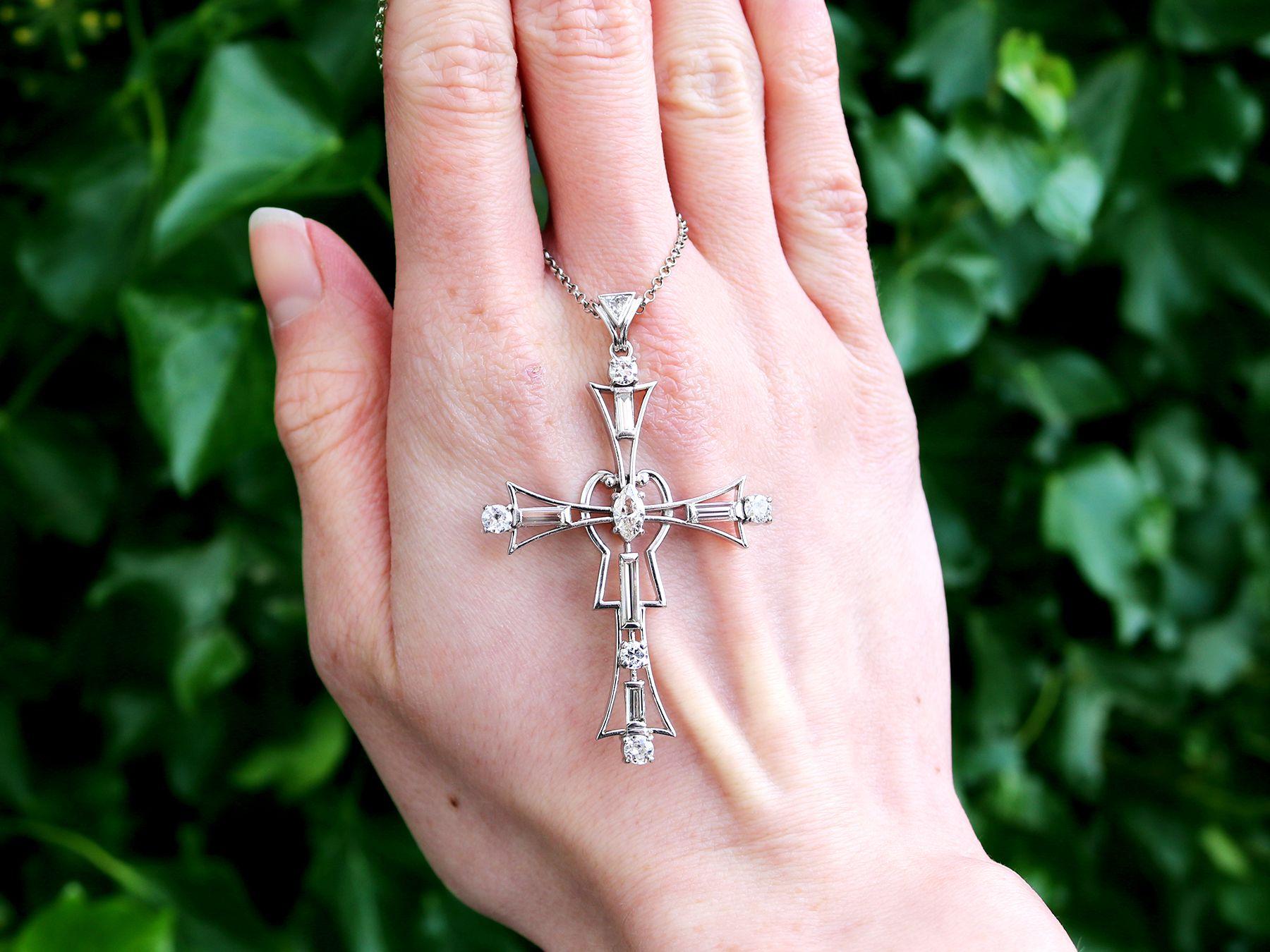 A stunning, fine and impressive antique 1930s 1.93 carat diamond and platinum cross pendant; part of our diverse antique jewelry and estate jewelry collections

This stunning, fine and impressive antique diamond pendant has been crafted in