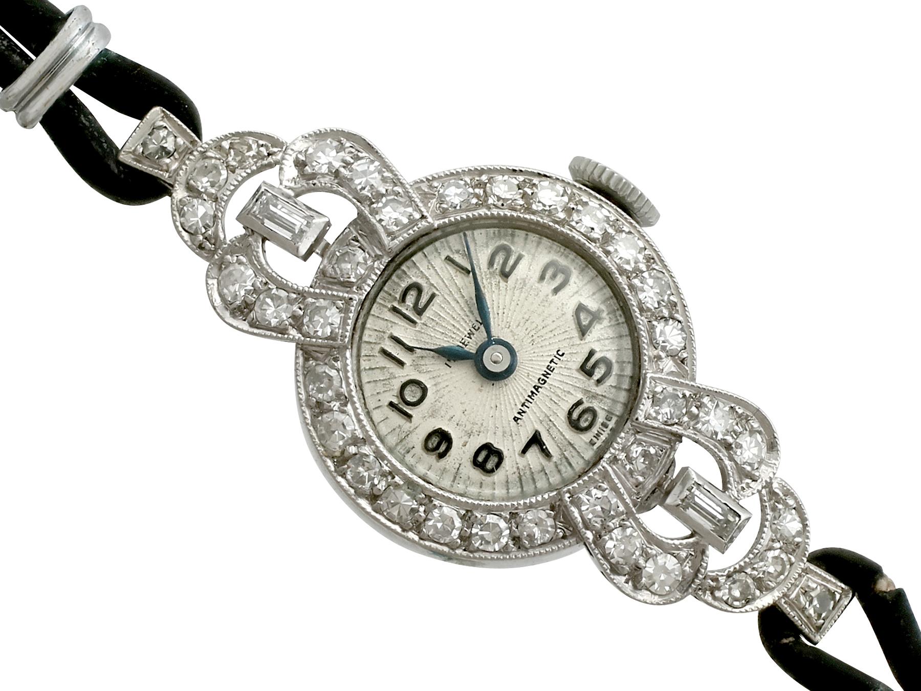 A fine Art Deco cocktail watch in platinum with 1.42 carat (total) diamonds; part of our antique jewelry and estate jewelry collections

This impressive antique Art Deco style ladies watch has been crafted in platinum.

The 1930s cocktail watch has