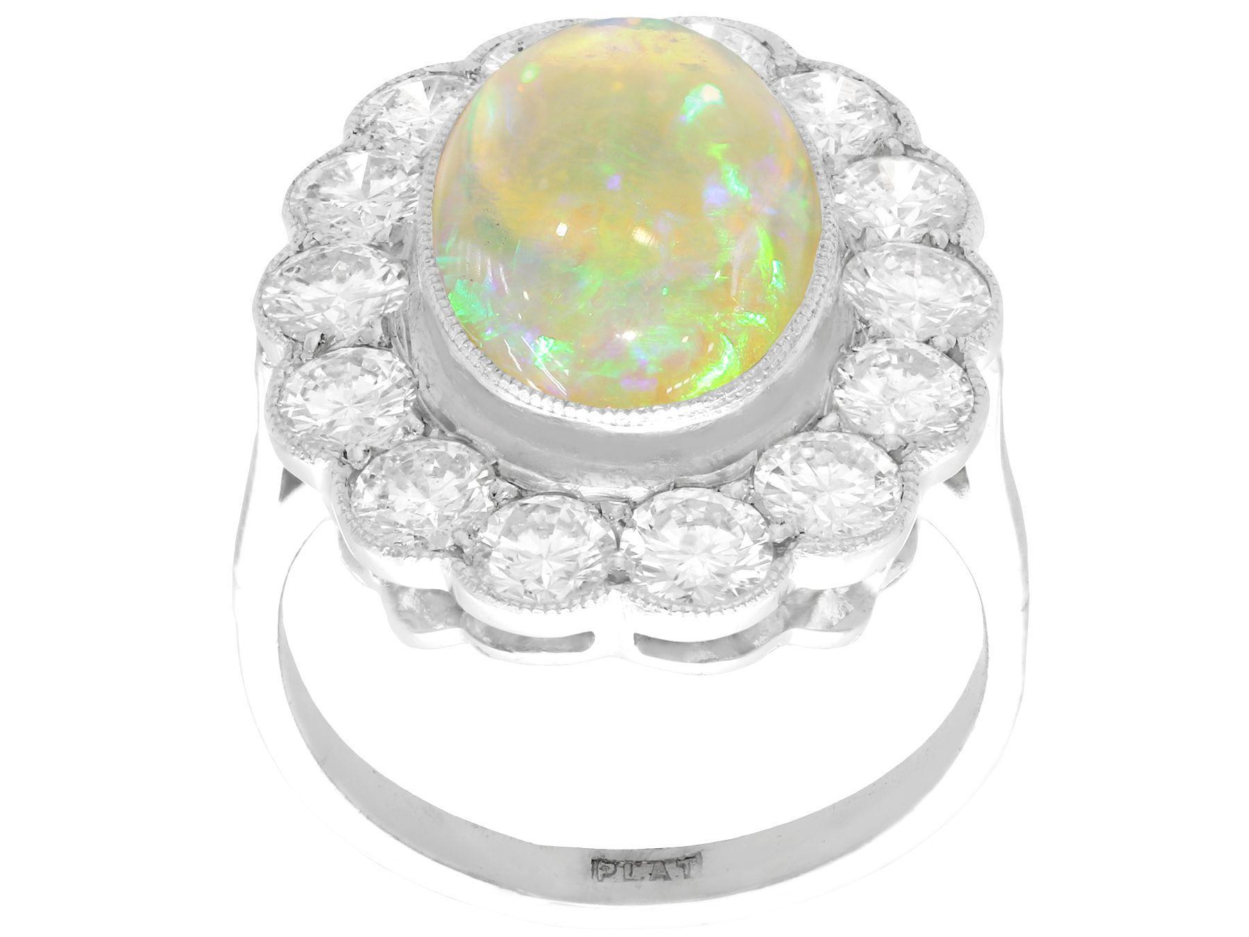 Oval Cut Antique 2.19ct White Opal and 2.36ct Diamond Platinum Cluster Ring For Sale