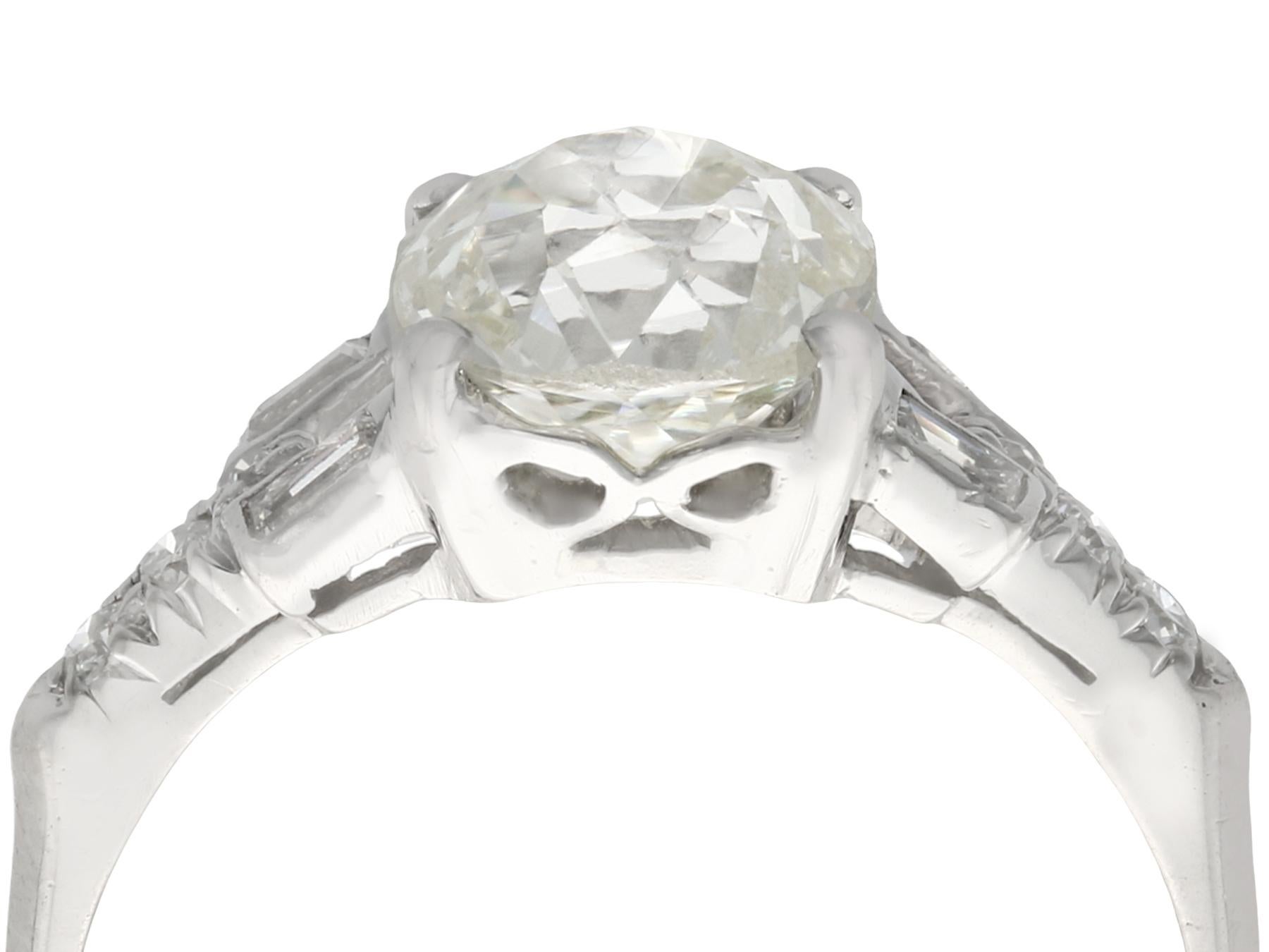 An impressive antique 1930's 2.21 carat diamond and platinum solitaire style engagement ring; part of our diverse antique estate jewelry collections.

This fine and impressive 1930's engagement ring has been crafted in platinum.

The pierced