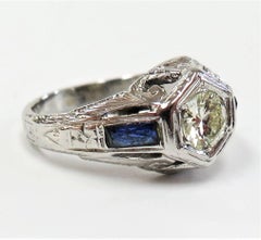 Antique 1930s Art Deco Ring, 0.52 Carat Diamond, Side Sapphires, 14 Karat