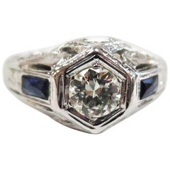 Antique 1930s Art Deco Ring, 0.52 Carat Diamond, Side Sapphires, 14 Karat