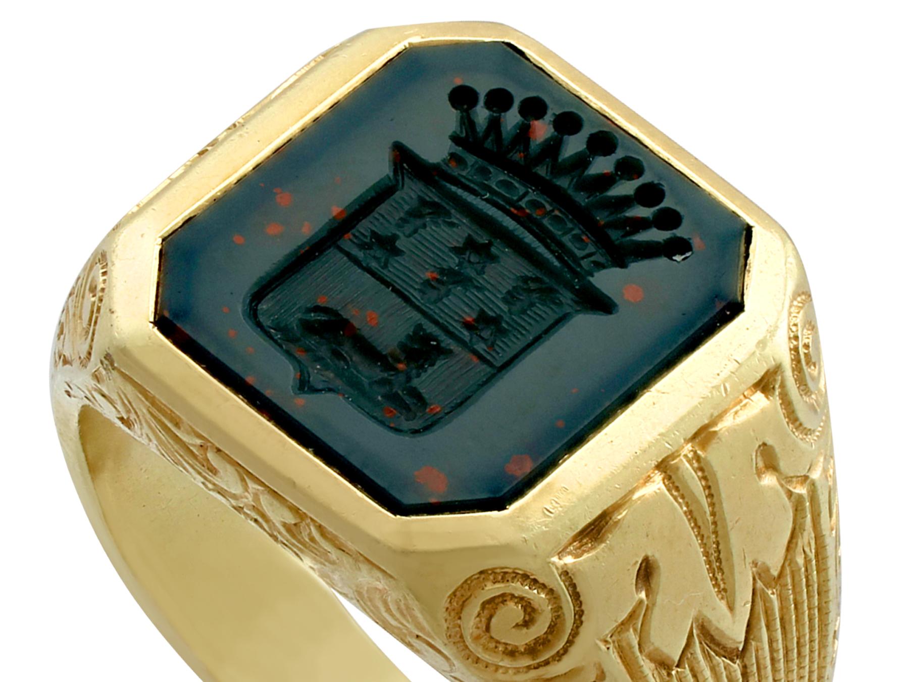 An impressive antique 1930's bloodstone and 14 carat yellow gold signet ring; part of our diverse antique jewellery and estate jewelry collections.

This fine and impressive antique signet ring has been crafted in 14ct yellow gold.

The substantial