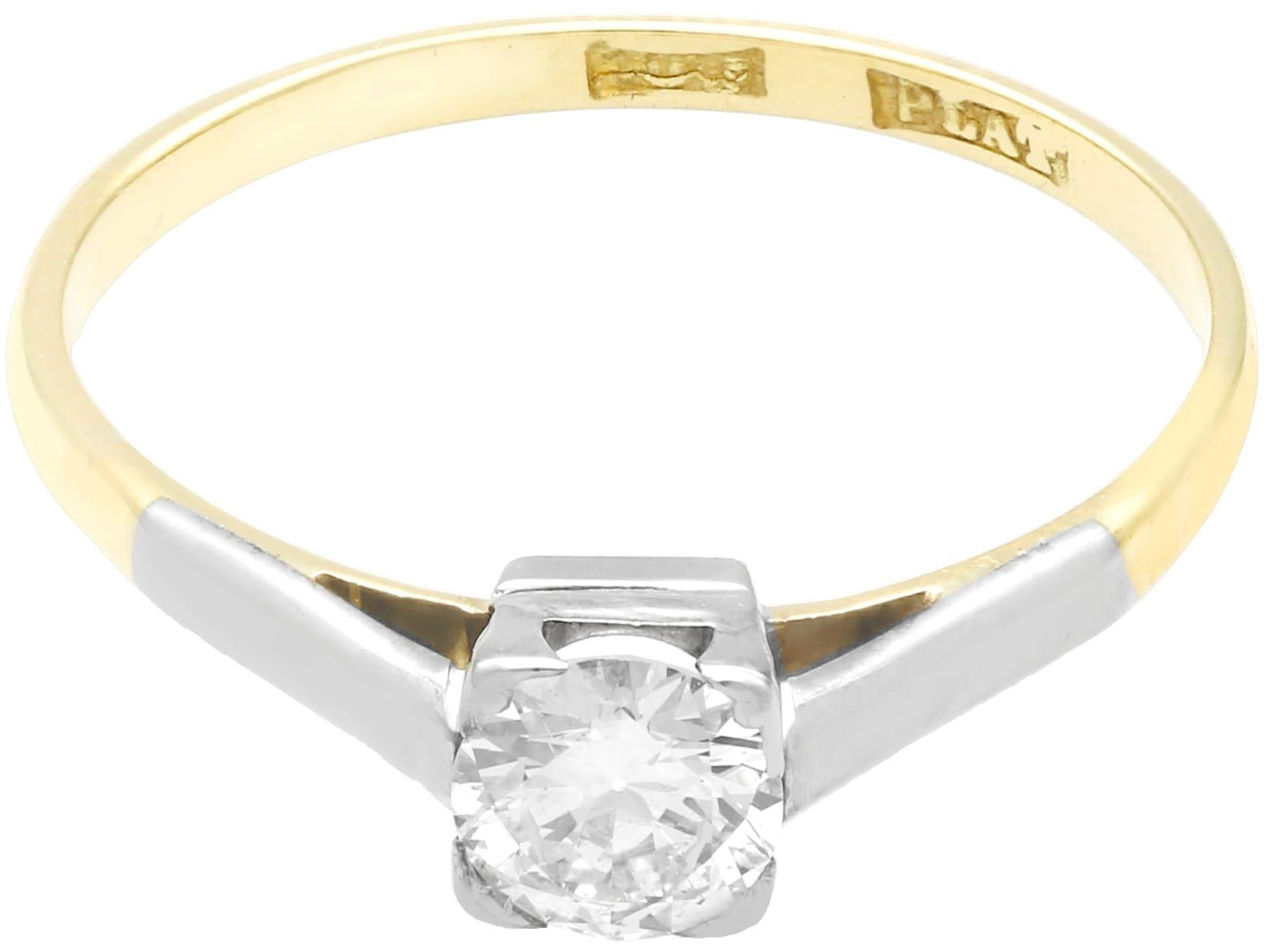 A fine and impressive 0.60 carat diamond and 18k yellow gold, platinum set solitaire ring; part of our diverse antique jewelry and estate jewelry collections.

This fine and impressive 1930s engagement ring has been crafted in 18k yellow gold with a
