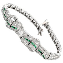 Vintage 1930s Diamond Emerald Platinum Ribbon and Bow Bracelet
