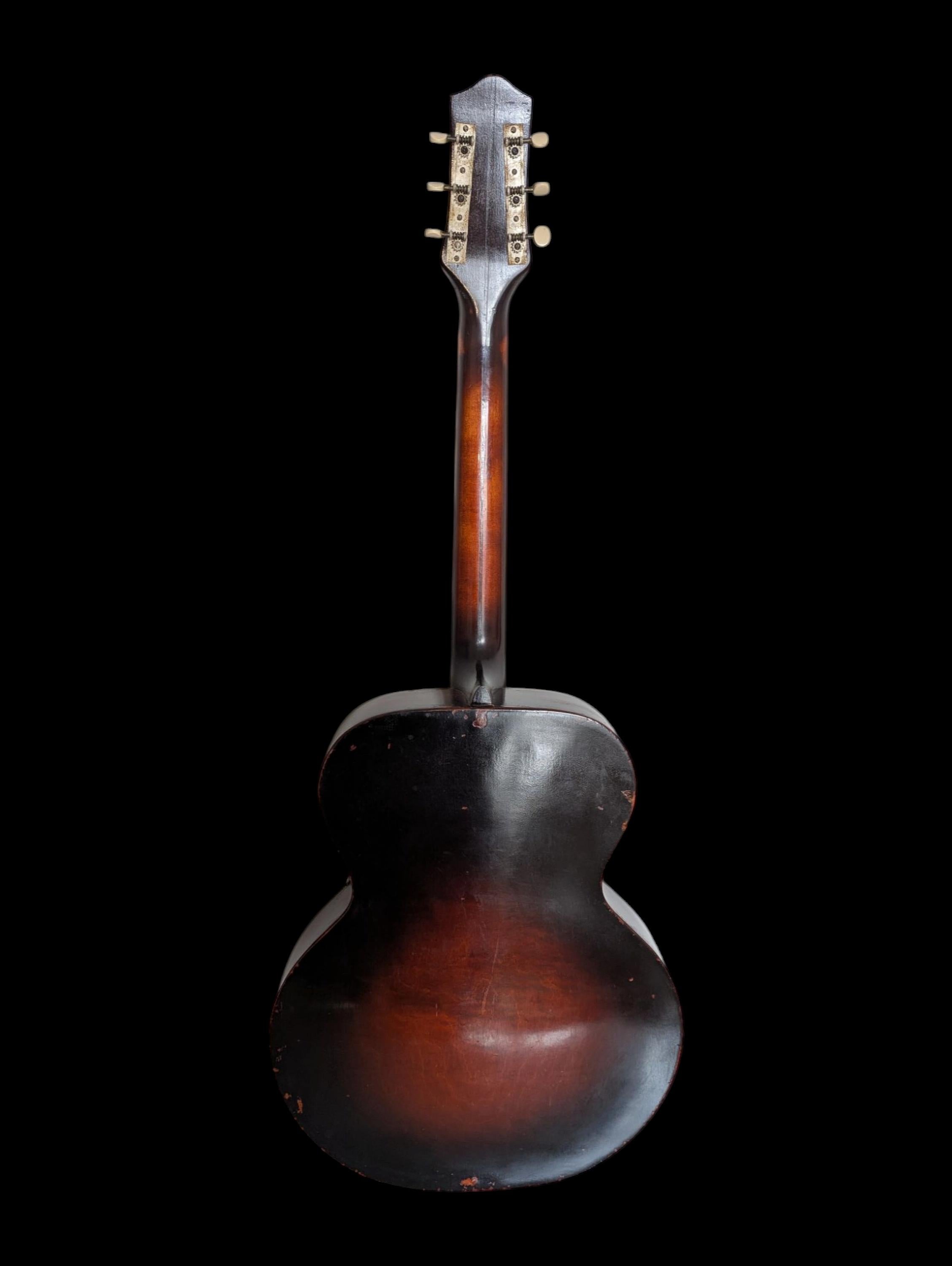 **Antique 1930s Gretsch 150 Archtop Acoustic Guitar – Vintage Elegance with Timeless Tone**

Step into the golden age of American craftsmanship with this stunning antique 1930s Gretsch Model 150 Archtop Acoustic Guitar. A rare and beautiful example
