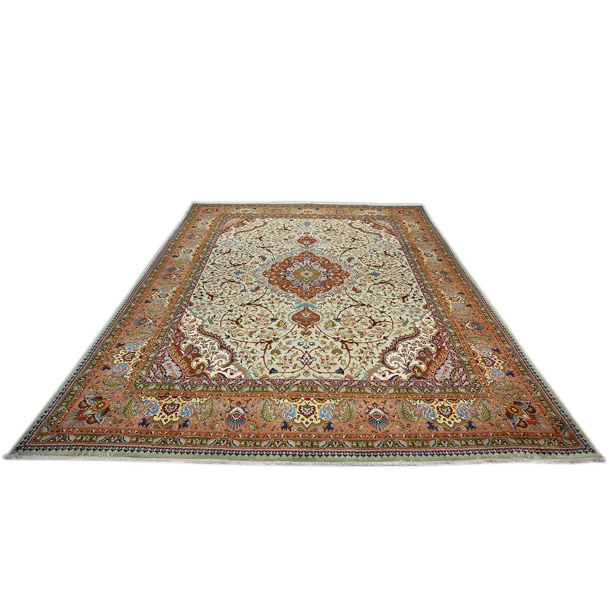  Ashly Fine Rugs presents a 1930s Antique Persian Tabriz 9x13 Wool Handmade Rug. Tabriz is a northern city in modern-day Iran and has forever been famous for the fineness and craftsmanship of its handmade rugs.

 This rug has a wonderful light