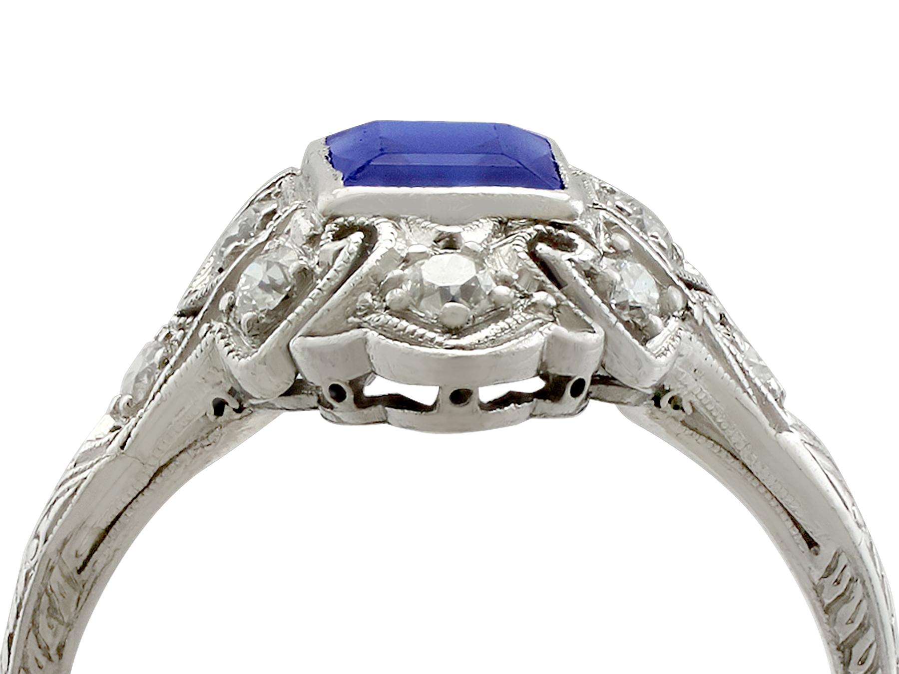 A stunning antique 1930's 0.79 carat blue sapphire and 0.22 carat diamond, platinum marquise shaped dress ring; part of our diverse antique jewelry collections.

This stunning, fine and impressive antique sapphire and diamond ring has been crafted