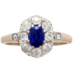Garnet, Sapphire, Emerald and Diamond Cluster Ring For Sale at 1stdibs