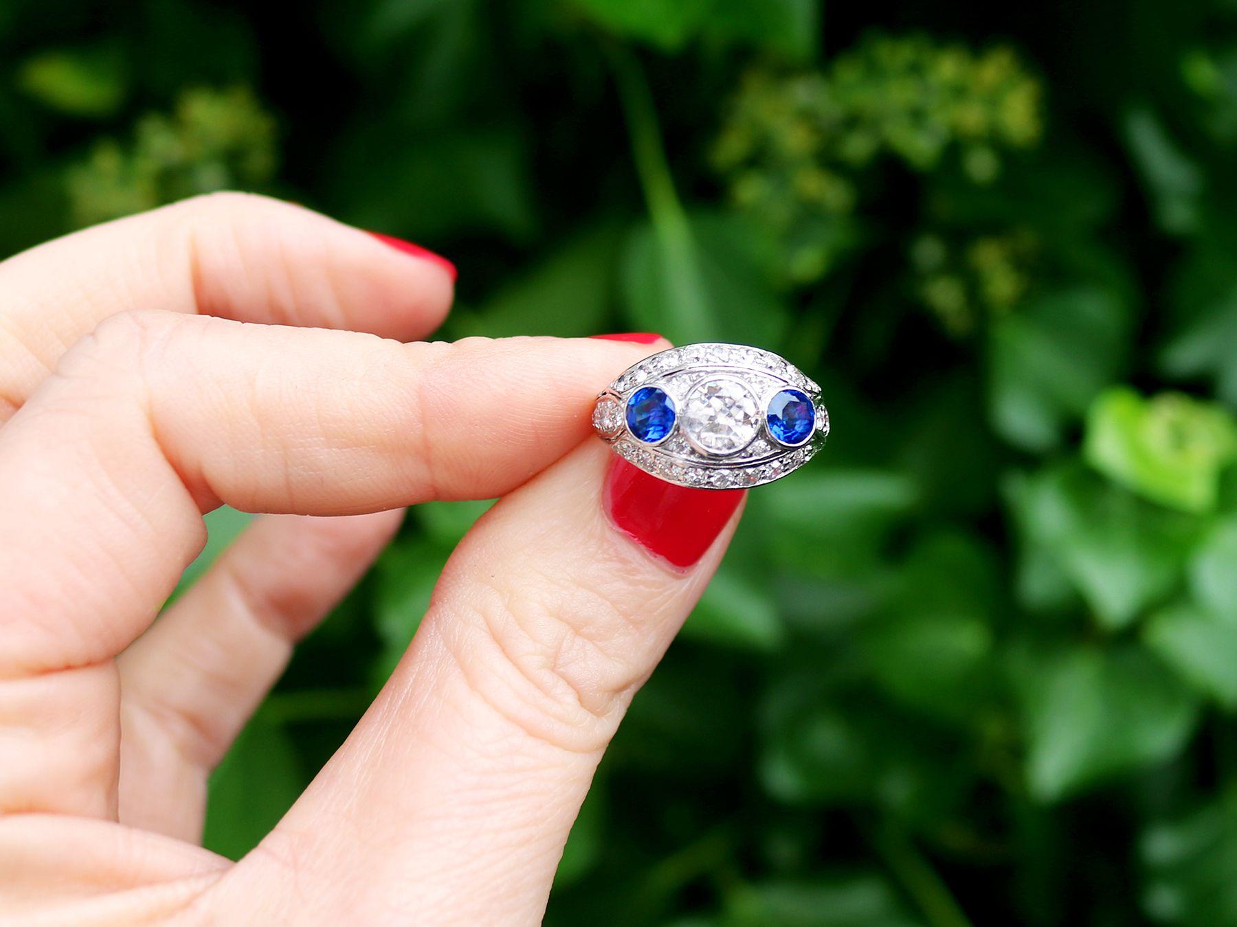 A stunning antique 1930s 1.94 carat diamond and 0.90 carat sapphire, platinum cocktail ring; part of our diverse antique jewelry and estate jewelry collections.

This stunning, fine and impressive antique sapphire ring has been crafted in