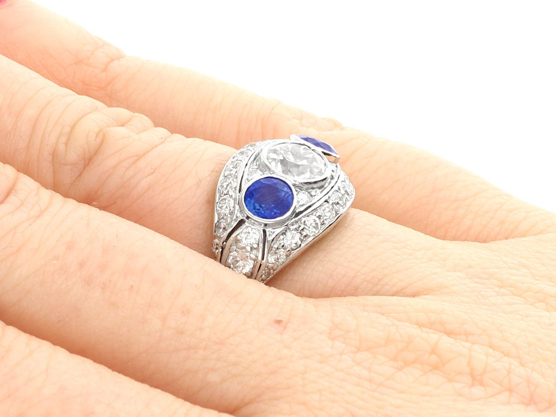 Women's or Men's Art Deco 1.94 Carat Diamond and Sapphire Platinum Cocktail Ring For Sale