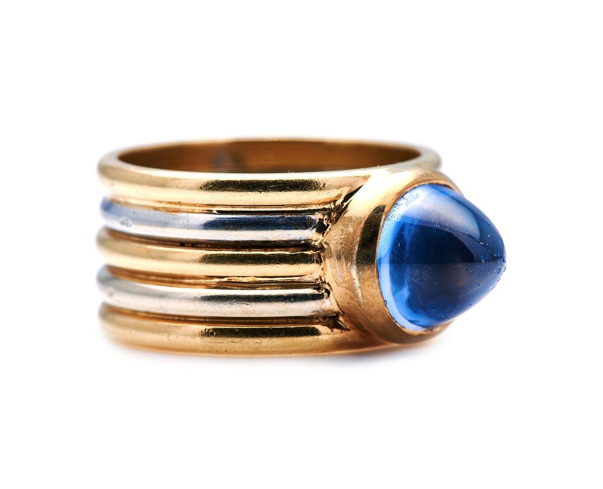 Cabochon Sapphire Ring. By the late 1930s, jewellers working in the geometric Art Deco style were in the thrall of the machine age, and increasingly took inspiration from simple, industrial motifs, often in multicoloured gold. This aesthetic looks