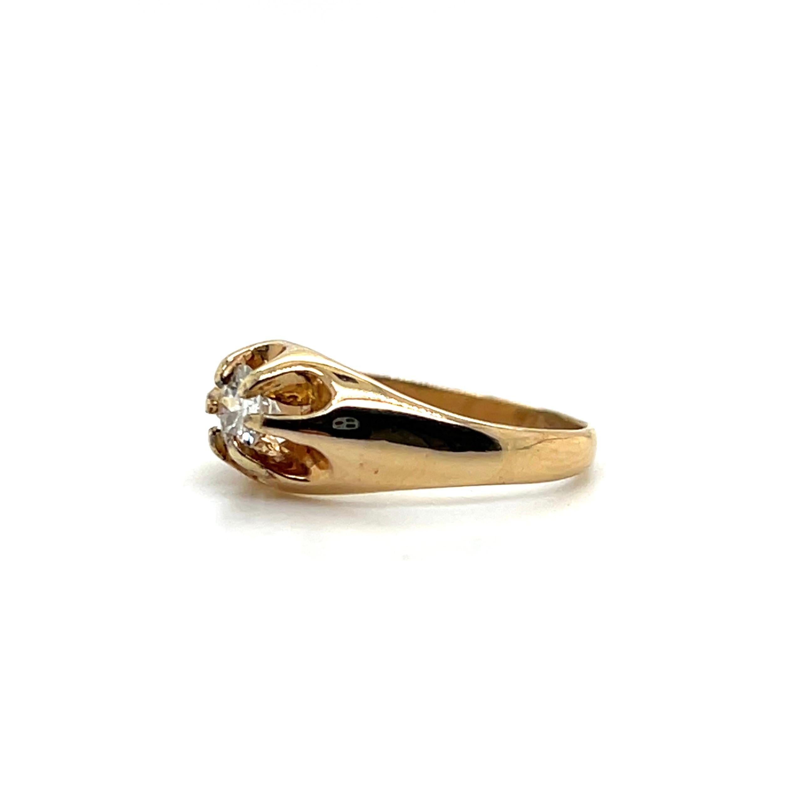 A charming 1940s 14 karat yellow gold ring that beautifully captures the understated elegance of mid-century design. Crafted in the classic belcher style — a popular setting of the era known for its sculptural prongs integrated into the band — this
