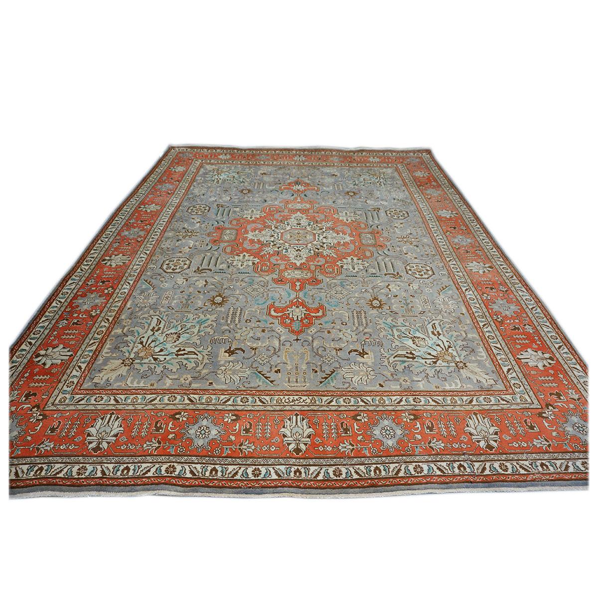 Ashly Fine Rugs presents a 1940s Antique Persian Tabriz 10x13 Wool Handmade Rug. Tabriz is a northern city in modern-day Iran and has forever been famous for the fineness and craftsmanship of its handmade rugs. These rugs are better known as the
