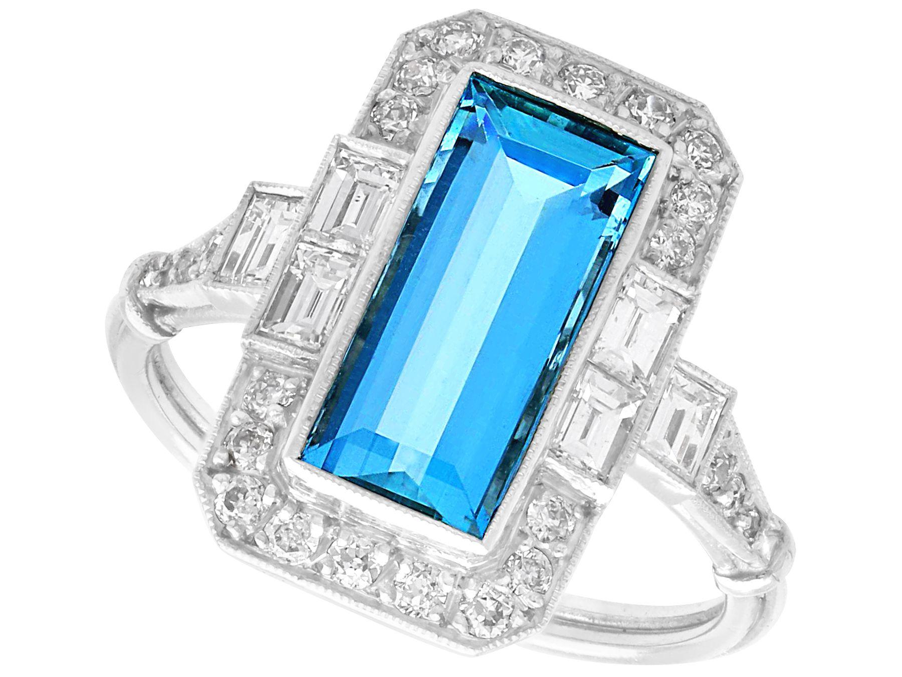 A stunning, fine and impressive 1.97 carat aquamarine, 0.94 carat diamond and platinum dress ring; part of our diverse gemstone jewelry and estate jewelry collections. 

This stunning, fine and impressive aquamarine ring has been crafted in