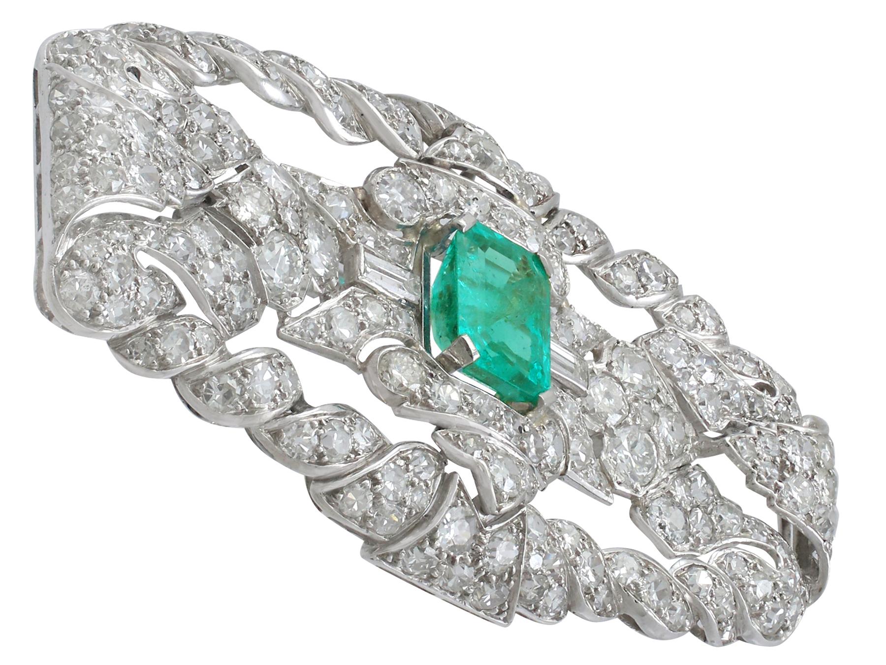 Art Deco Antique 1.98 Carat Emerald 5.22 Carat Diamond Platinum Brooch