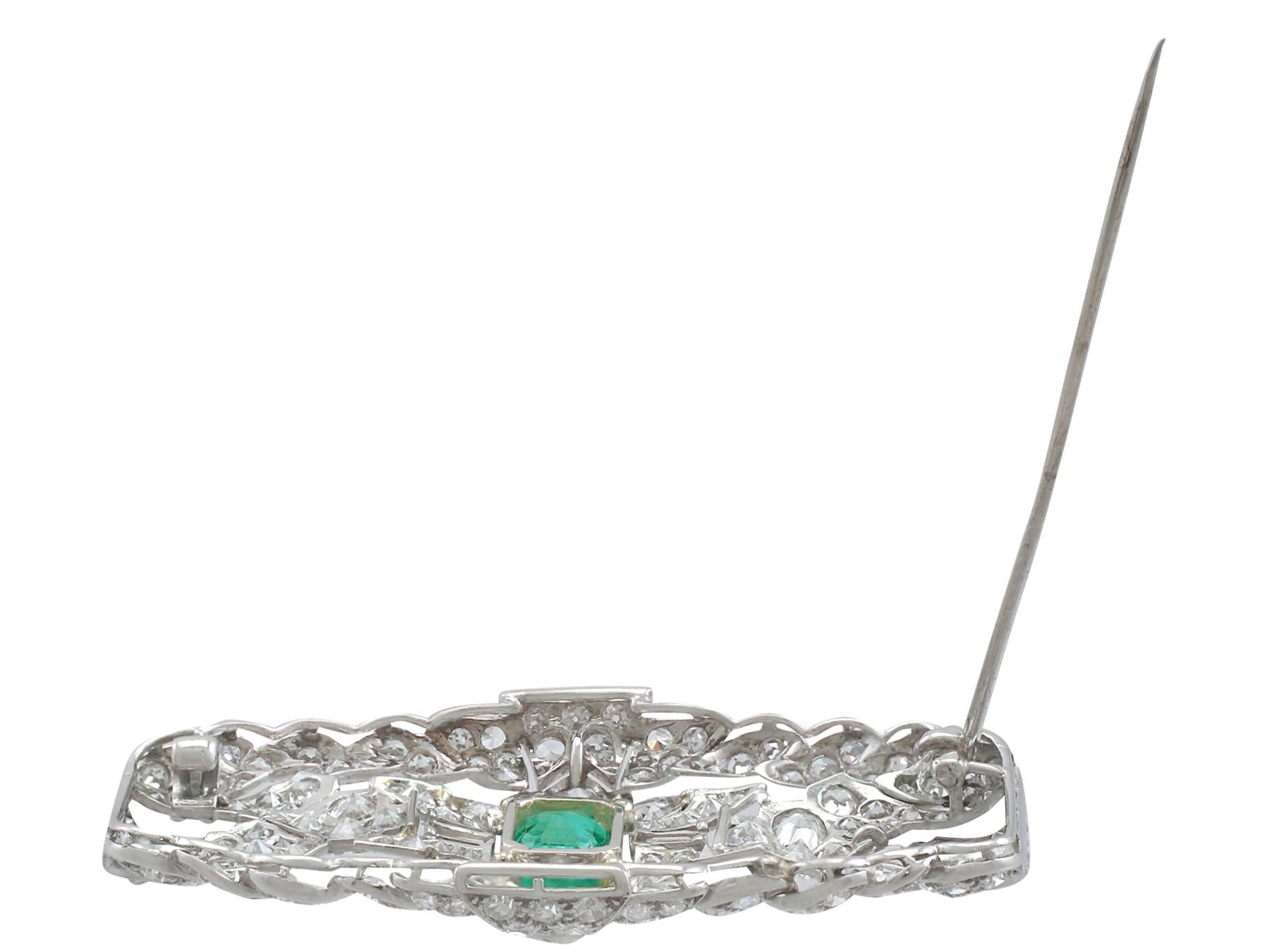 Women's Antique 1.98 Carat Emerald 5.22 Carat Diamond Platinum Brooch