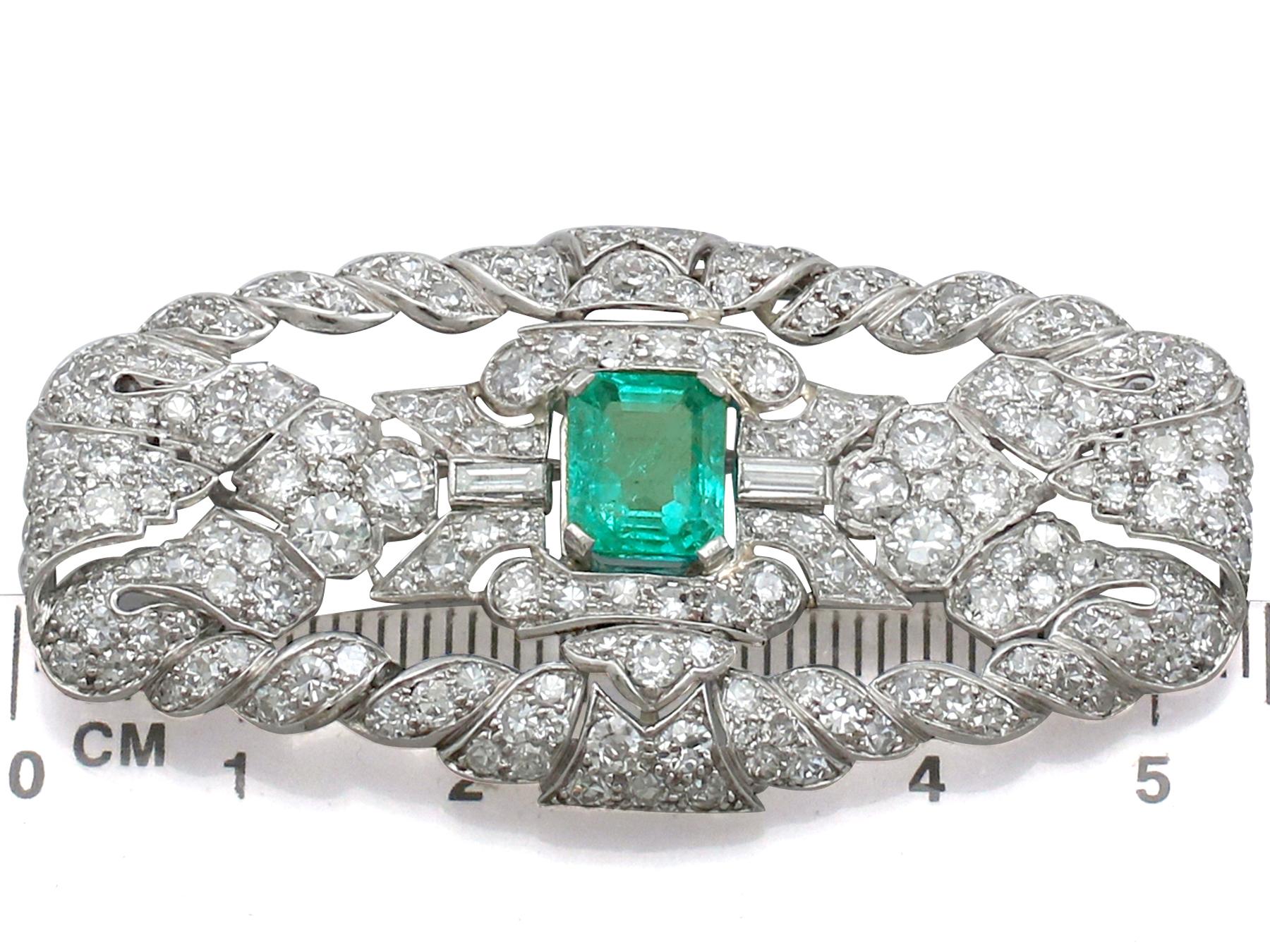 Antique 1.98 Carat Emerald 5.22 Carat Diamond Platinum Brooch 1