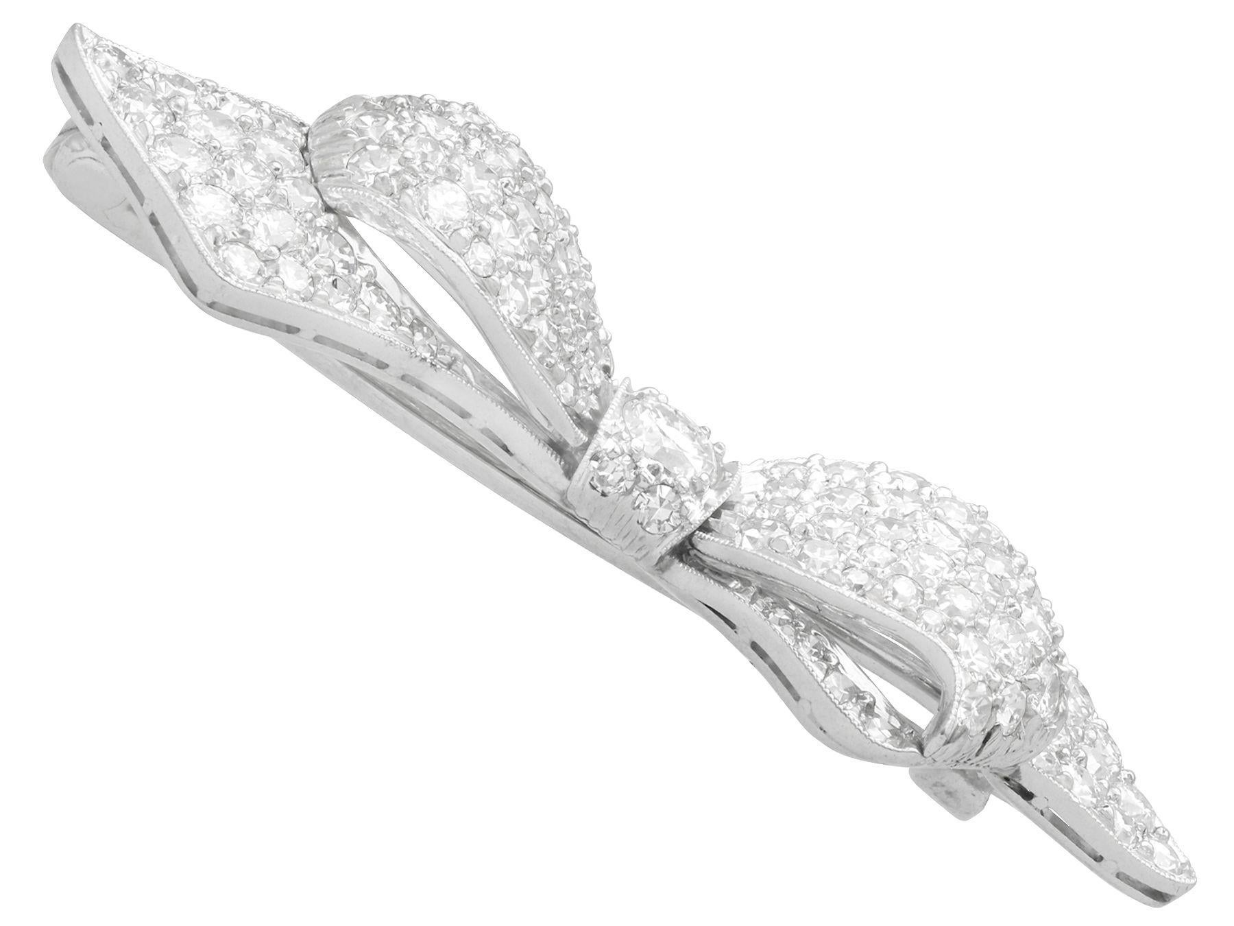 Women's or Men's Antique 1.99 Carat Diamond and Platinum Bow Brooch Circa 1900 For Sale