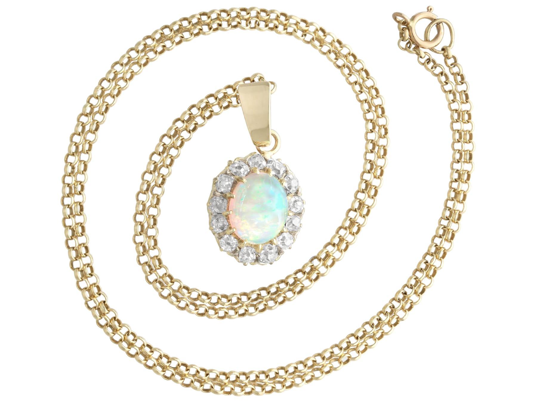 Cabochon 1920s Antique 1.99 Carat Opal and 1.02 Carat Diamond Yellow Gold Pendant For Sale
