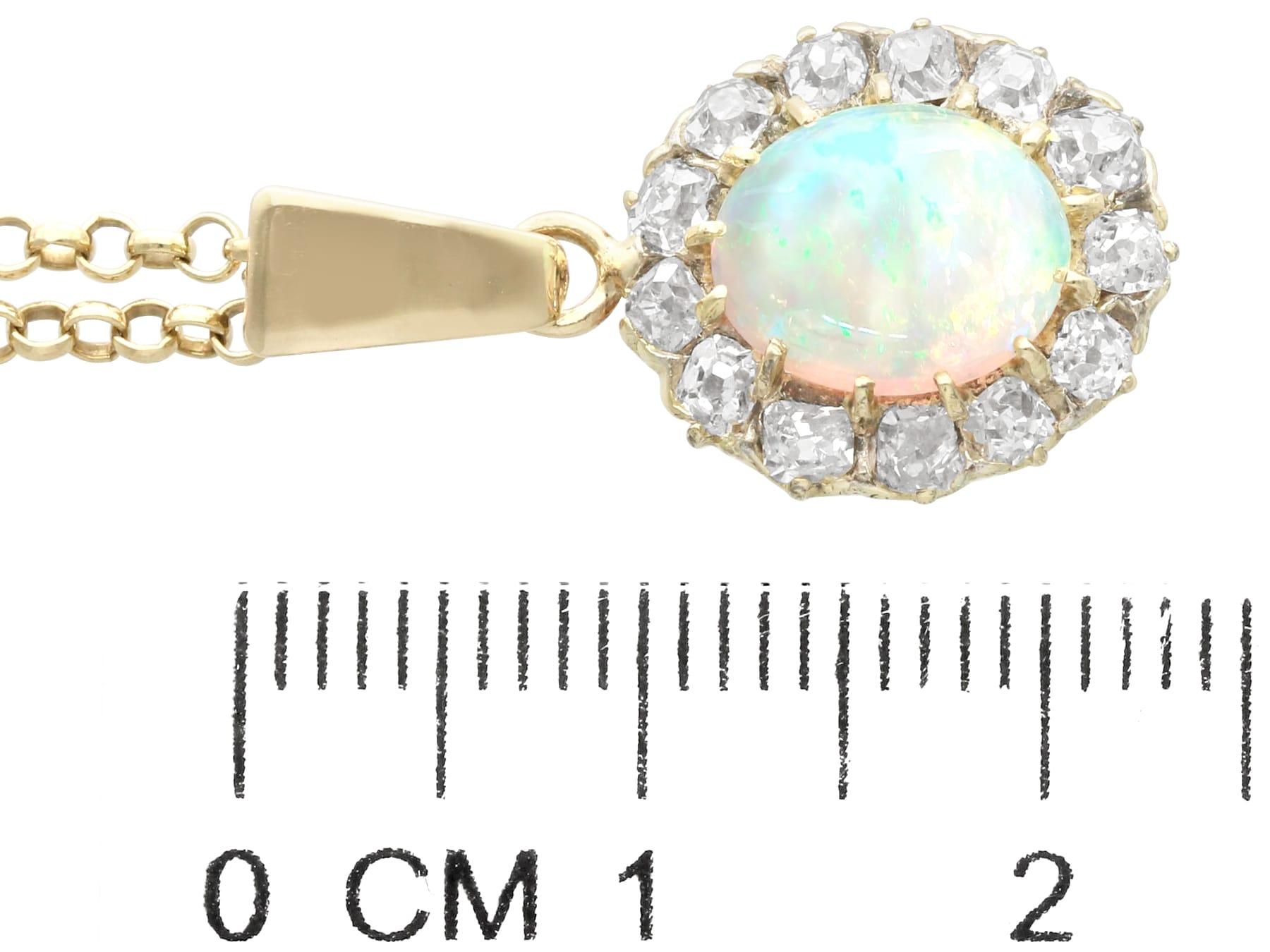 1920s Antique 1.99 Carat Opal and 1.02 Carat Diamond Yellow Gold Pendant For Sale 1
