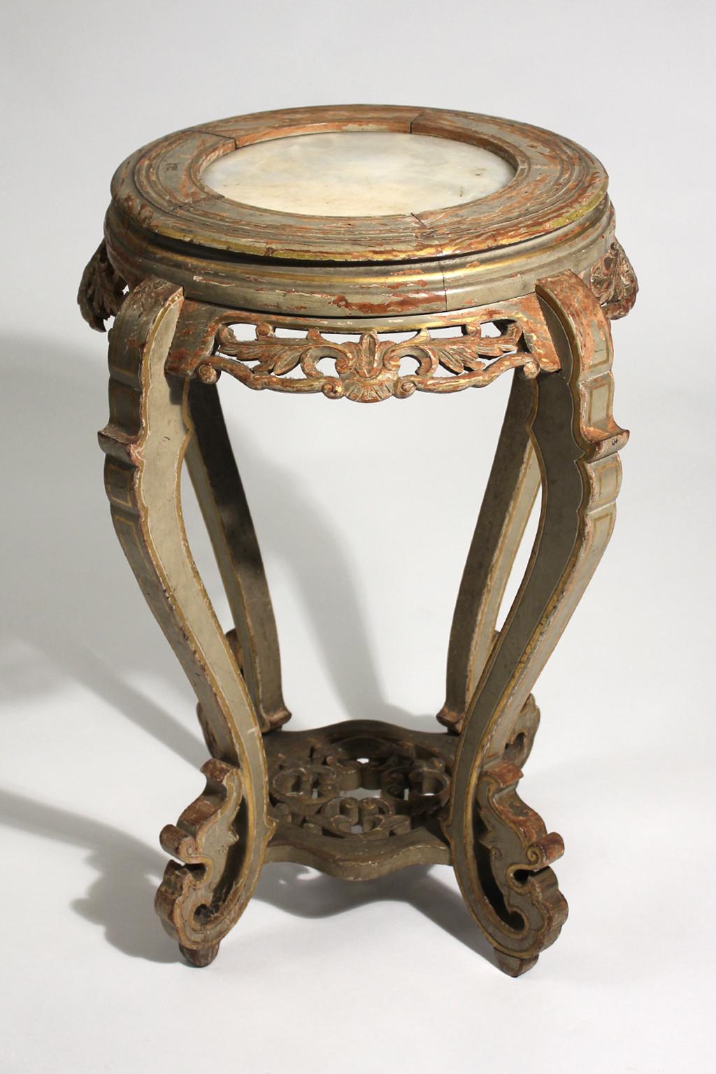 Very unique decorative French marble top side table dating from the 1800s. Great Baroque Revival style. Hand carved with great detail. Has the remains of the original painted surface. Color is gray with hand painted gold gilt accents. Top is made of