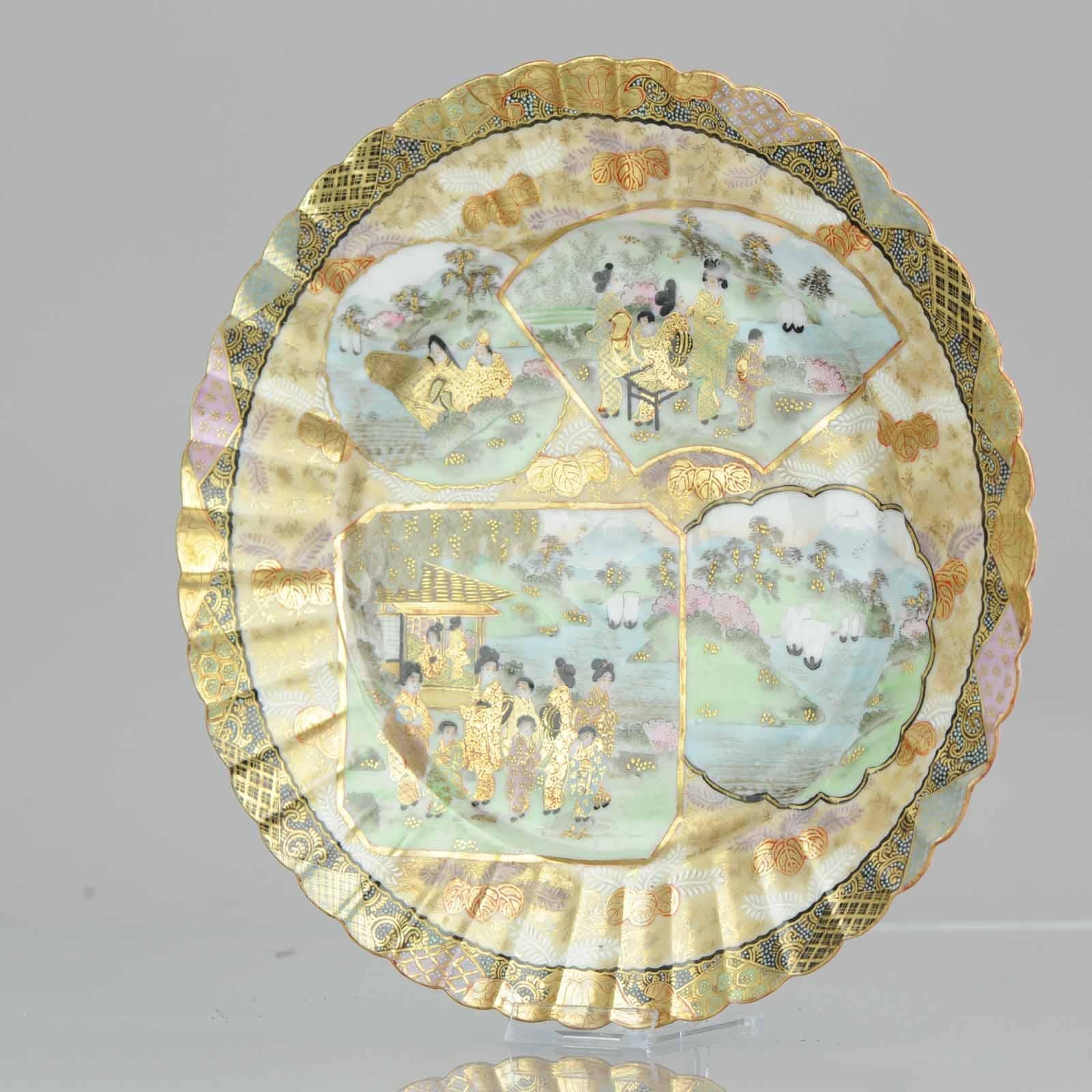 Fabulous Japanese dish. 19th century porcelain in Satsuma style. I think it is actually Kutani but the decoration is very much a reference to Satsuma ware. Fully decorated compartments of figures and boats in a landscape. Rest of the dish with